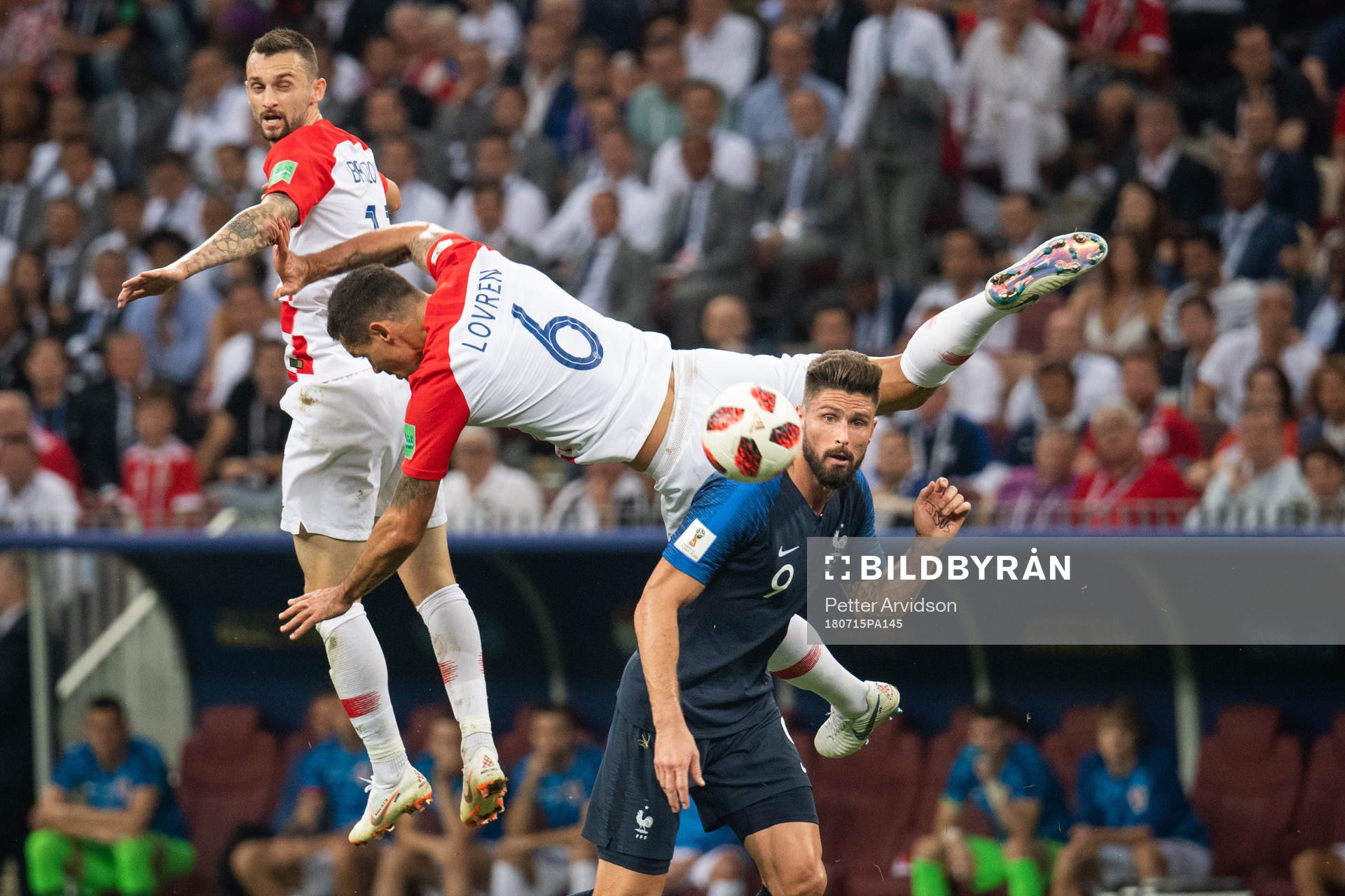 Dejan Lovren of Croatia falls in a duel with Olivier Giroud