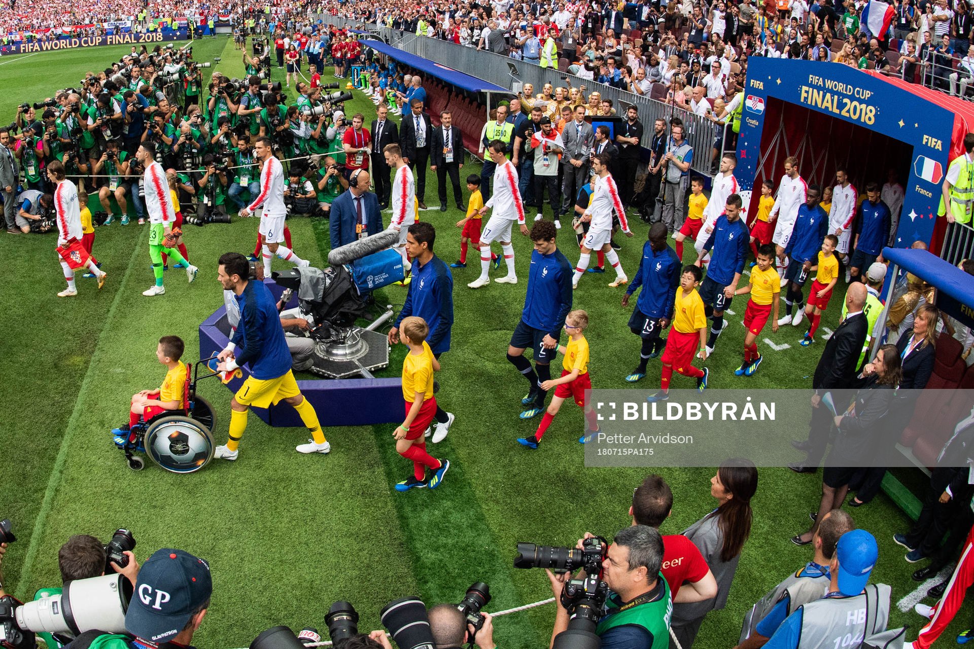 Players of France and of Croatia enter the pitch prior to