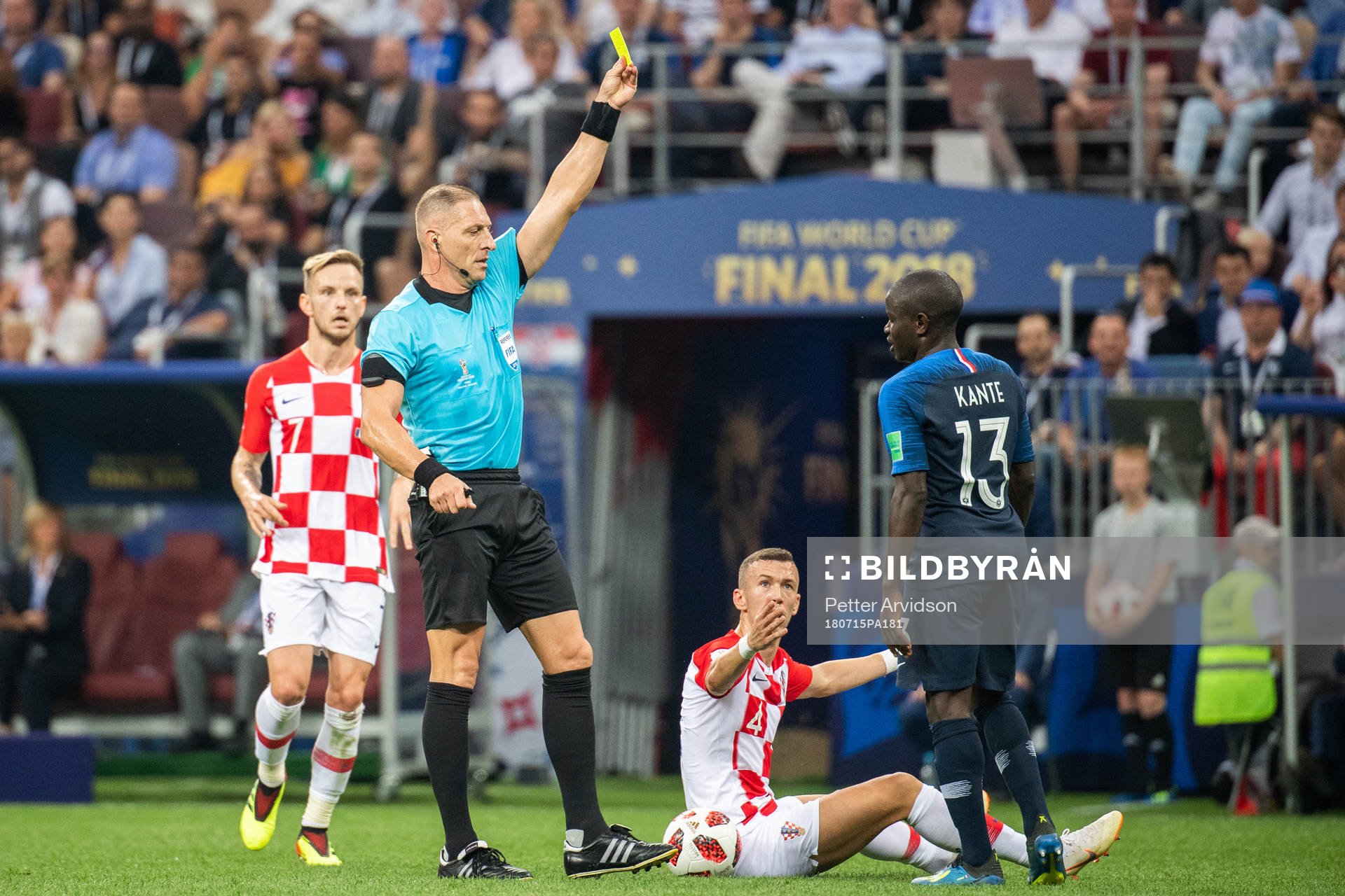 Ngolo Kante of France gets a yellow card from referee