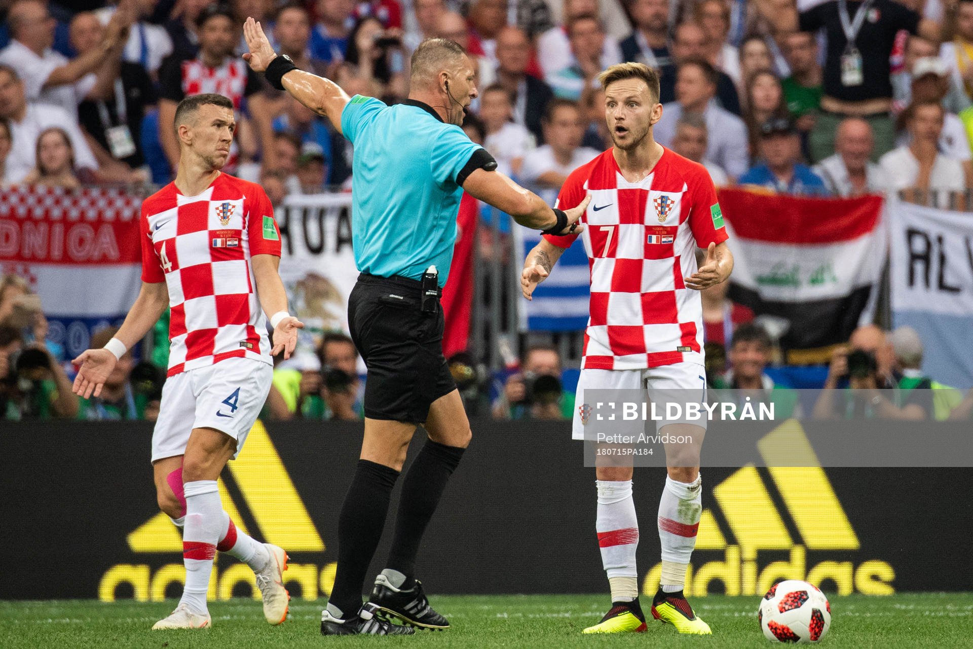 Ivan Rakitic of Croatia reacts against the referee Nestor