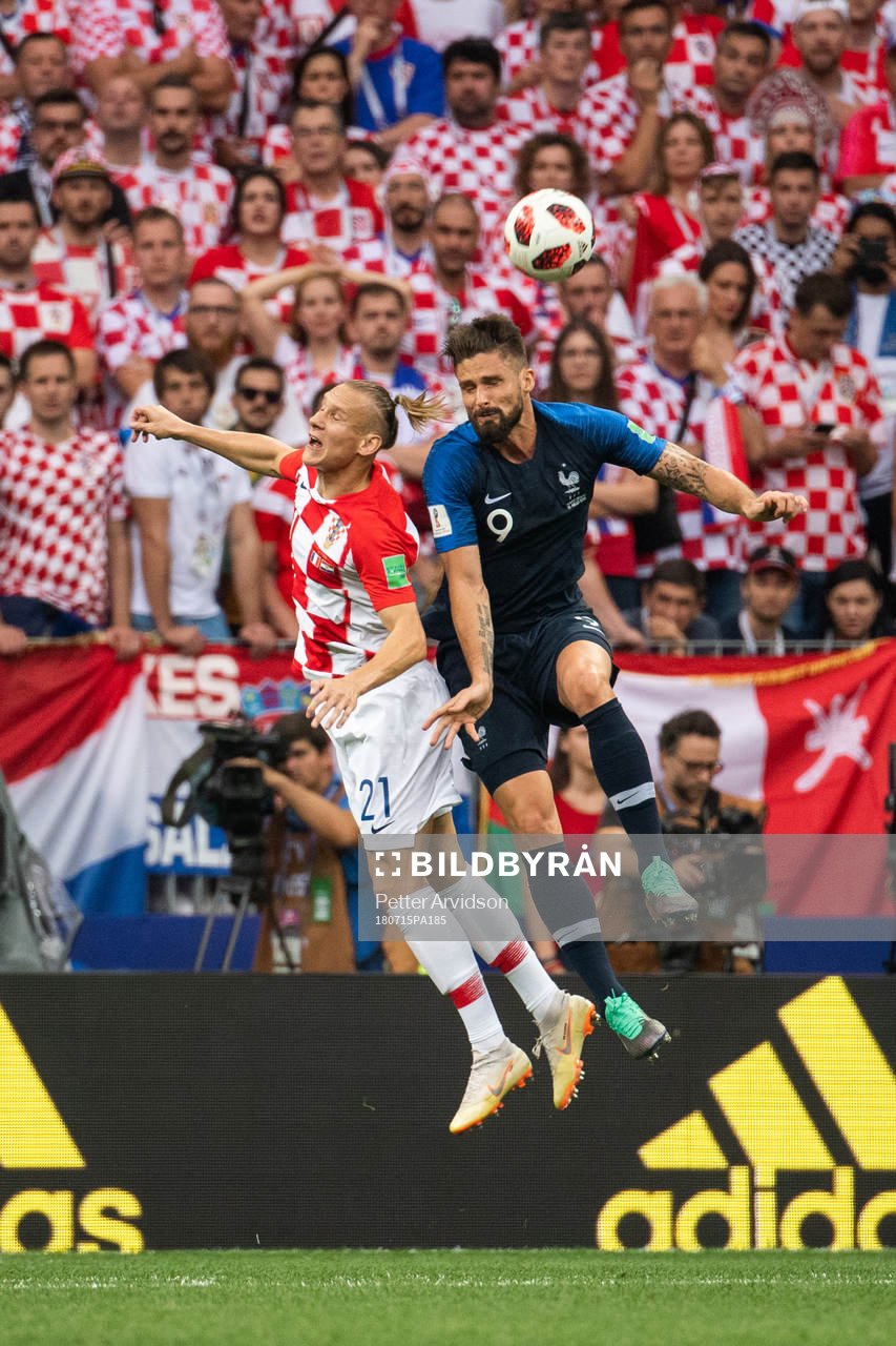 Dejan Lovren of Croatia and Olivier Giroud of France