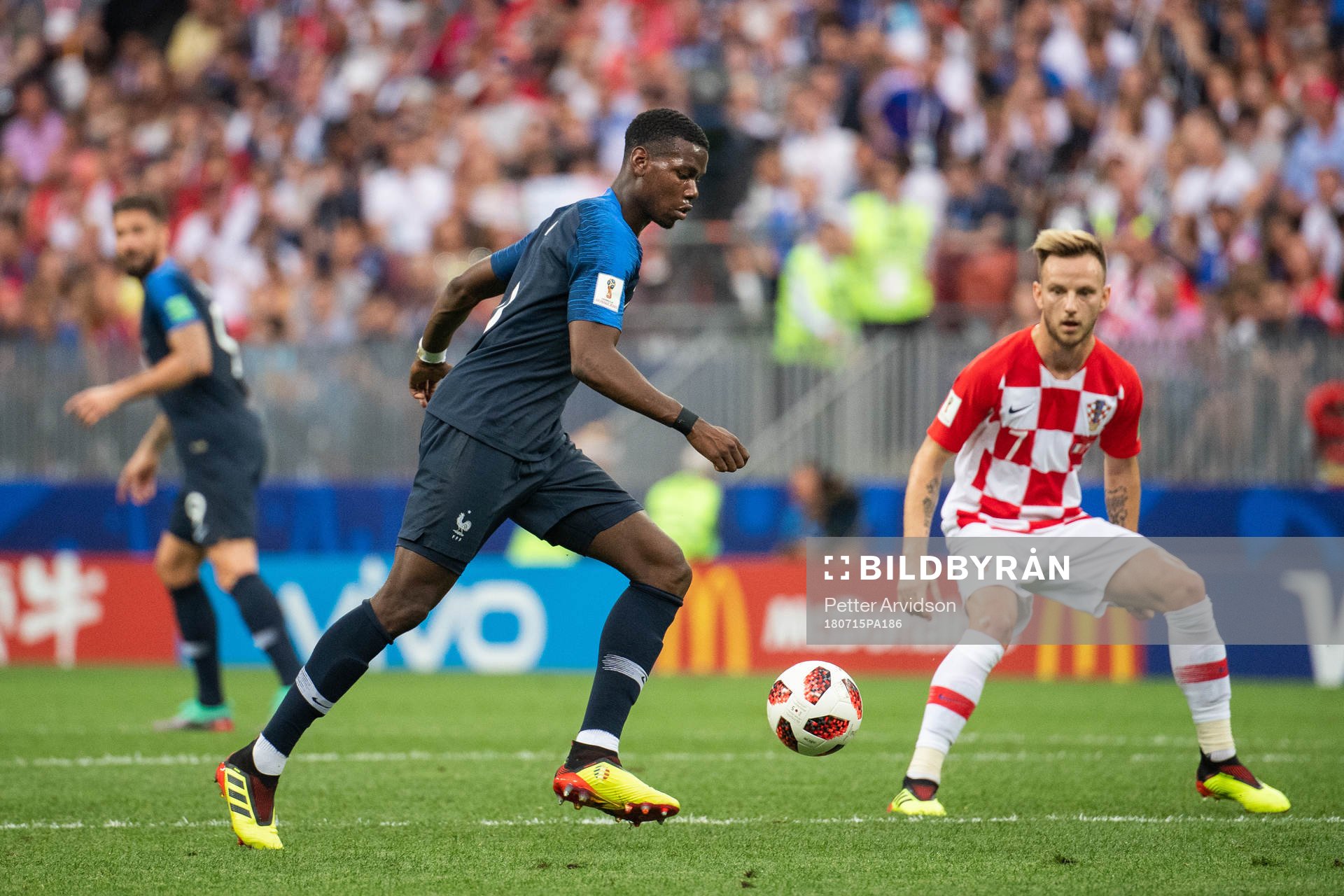 Paul Pogba of France and Ivan Rakitic of Croatia