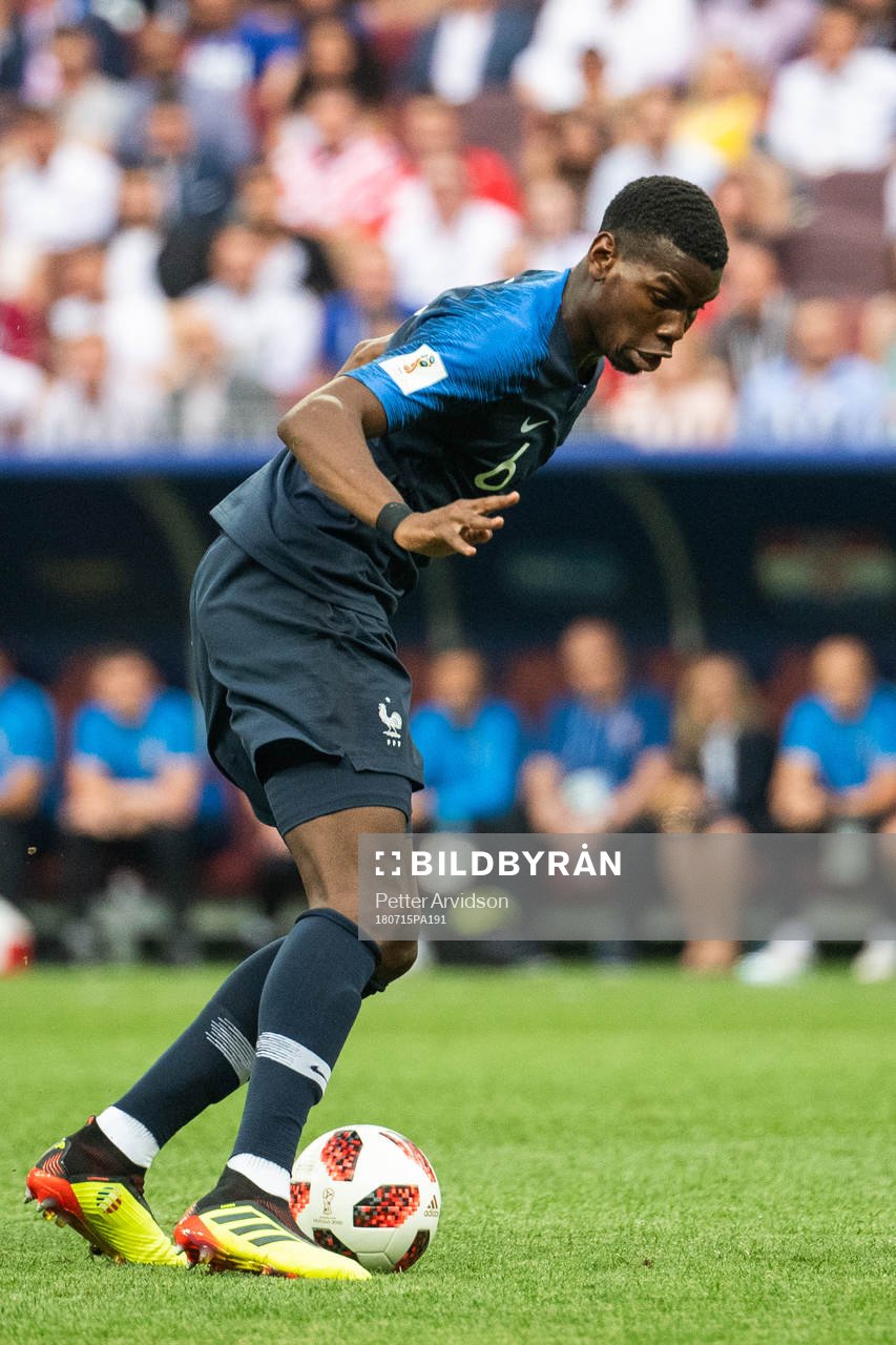 Ante Rebic of Croatia and Paul Pogba of France