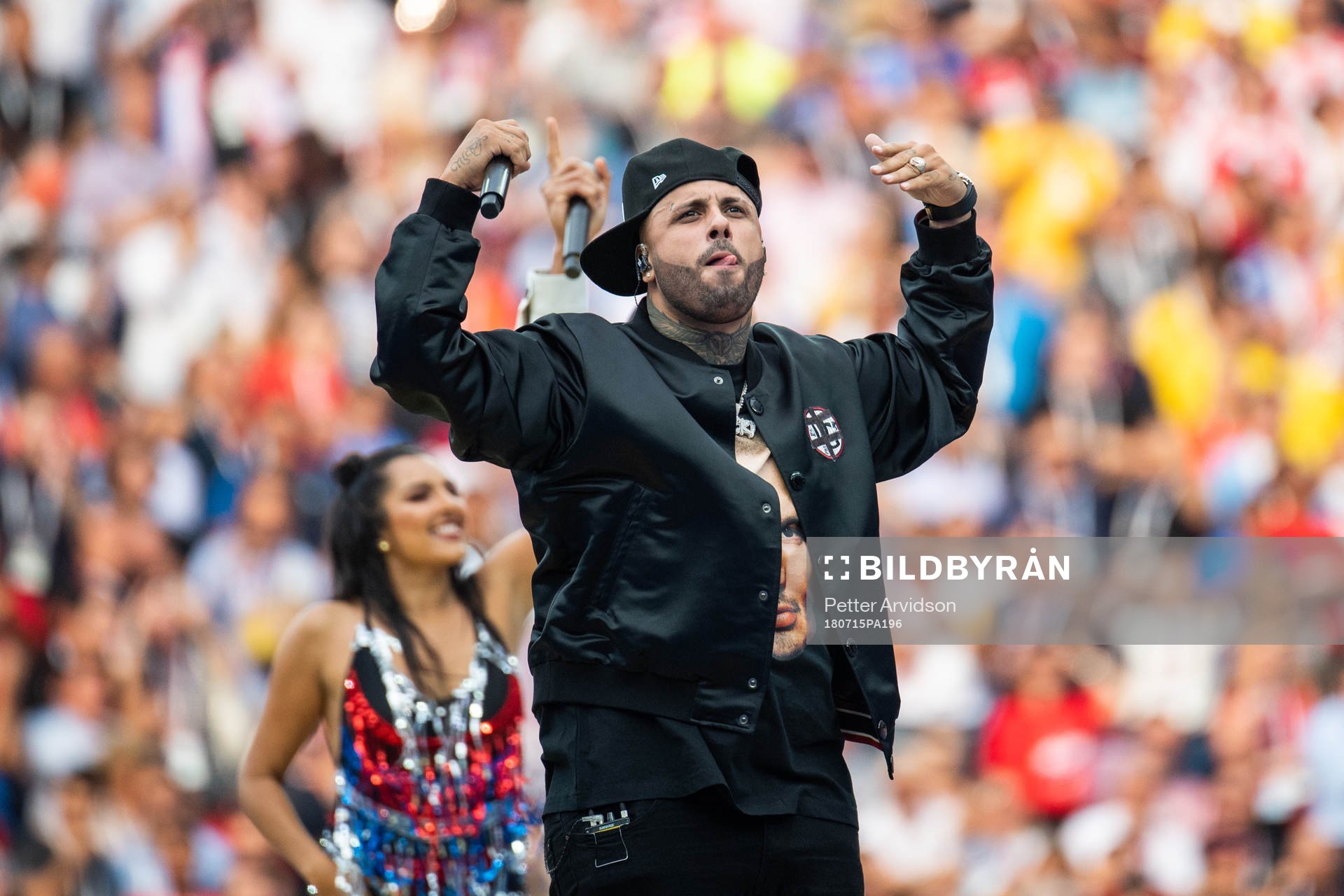 An artist singing at the closing ceremony prior to the FIFA