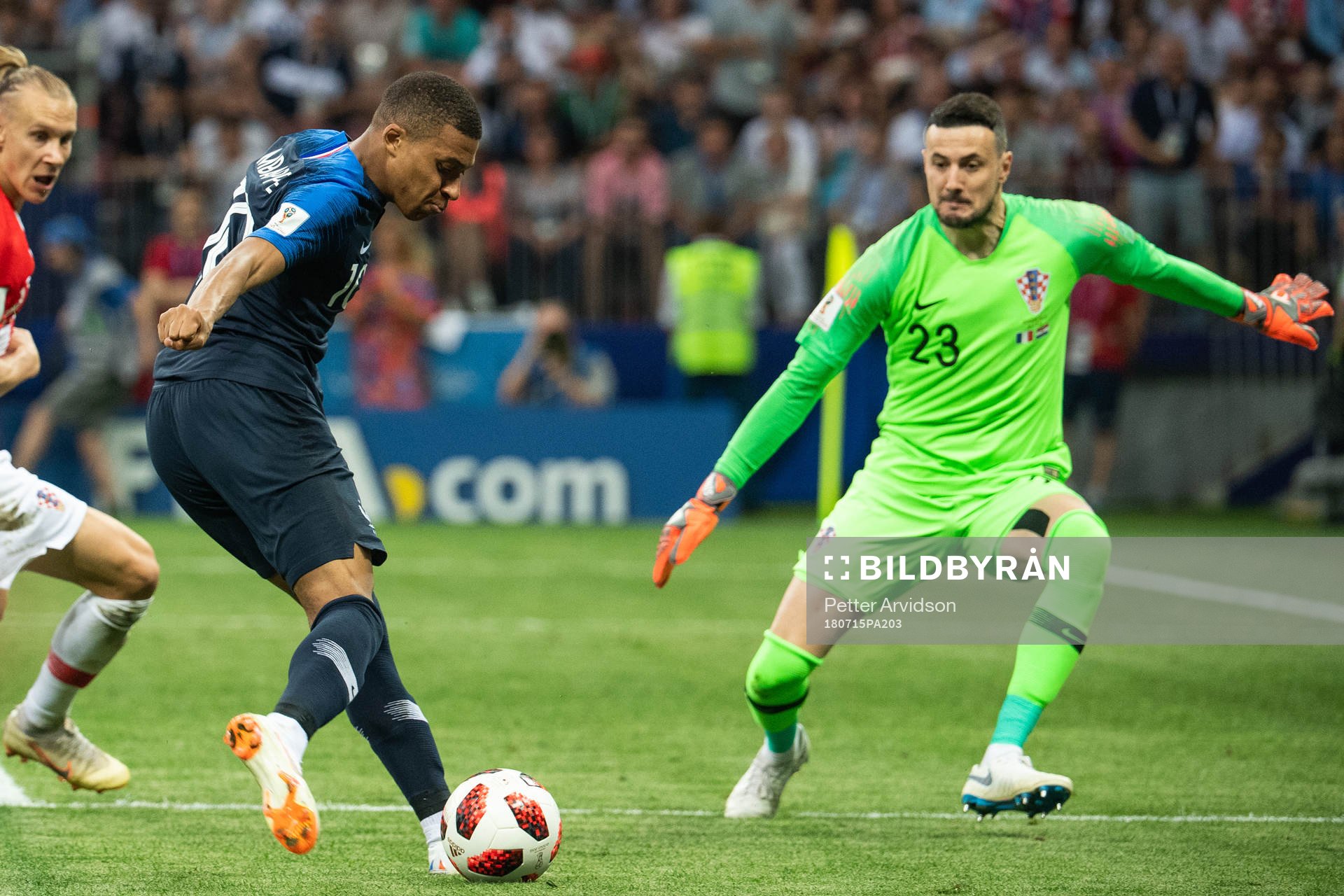 Kylian Mbappe of France and goalkeeper Danijel Subasic of