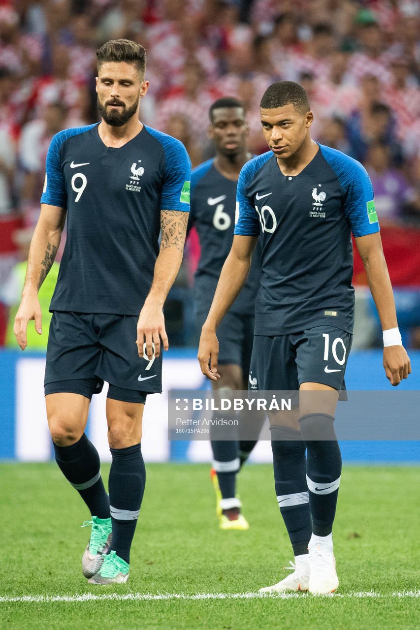 Olivier Giroud and Kylian Mbappe of France looks dejected