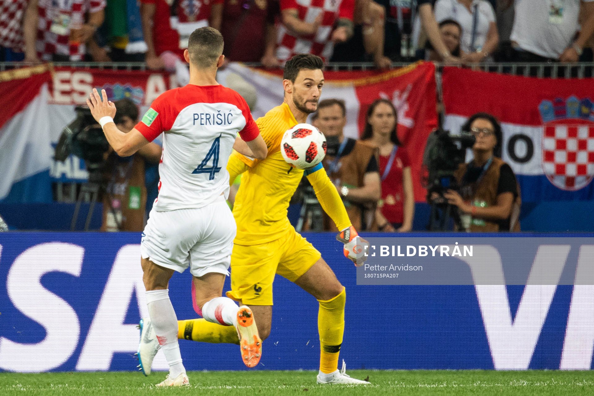 goalkeeper Hugo Lloris of France takes the ball in front of