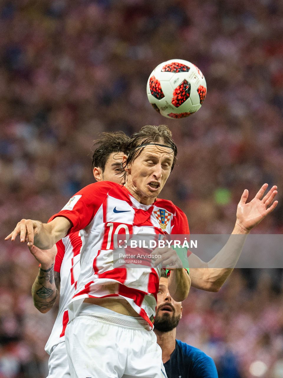 Luka Modric of Croatia with a header