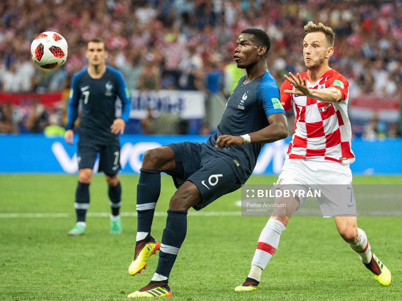 Paul Pogba of France and Ivan Rakitic of Croatia