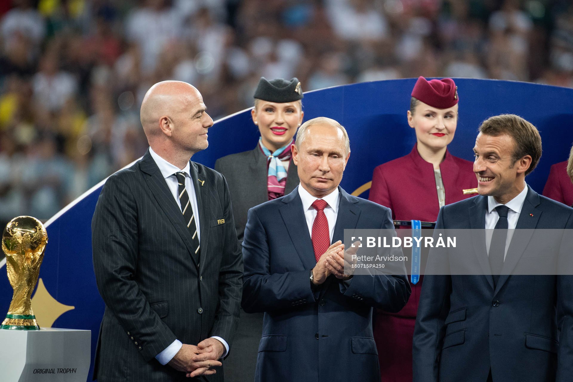 FIFA president Gianni Infantino, Vladimir Putin, president of Russia (middle) and the president of France, Emmanuel Macron, at the price ceremony after the FIFA World Cup final match between France and Croatia on July 15, 2018 in Moscow.