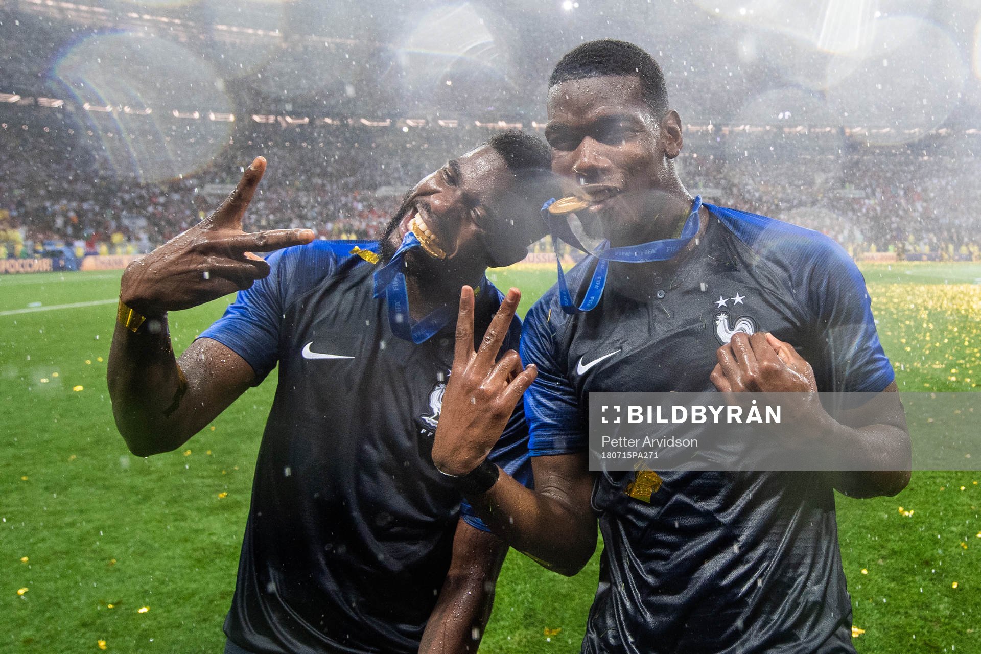 Samuel Umtiti and Paul Pogba of France celebrate