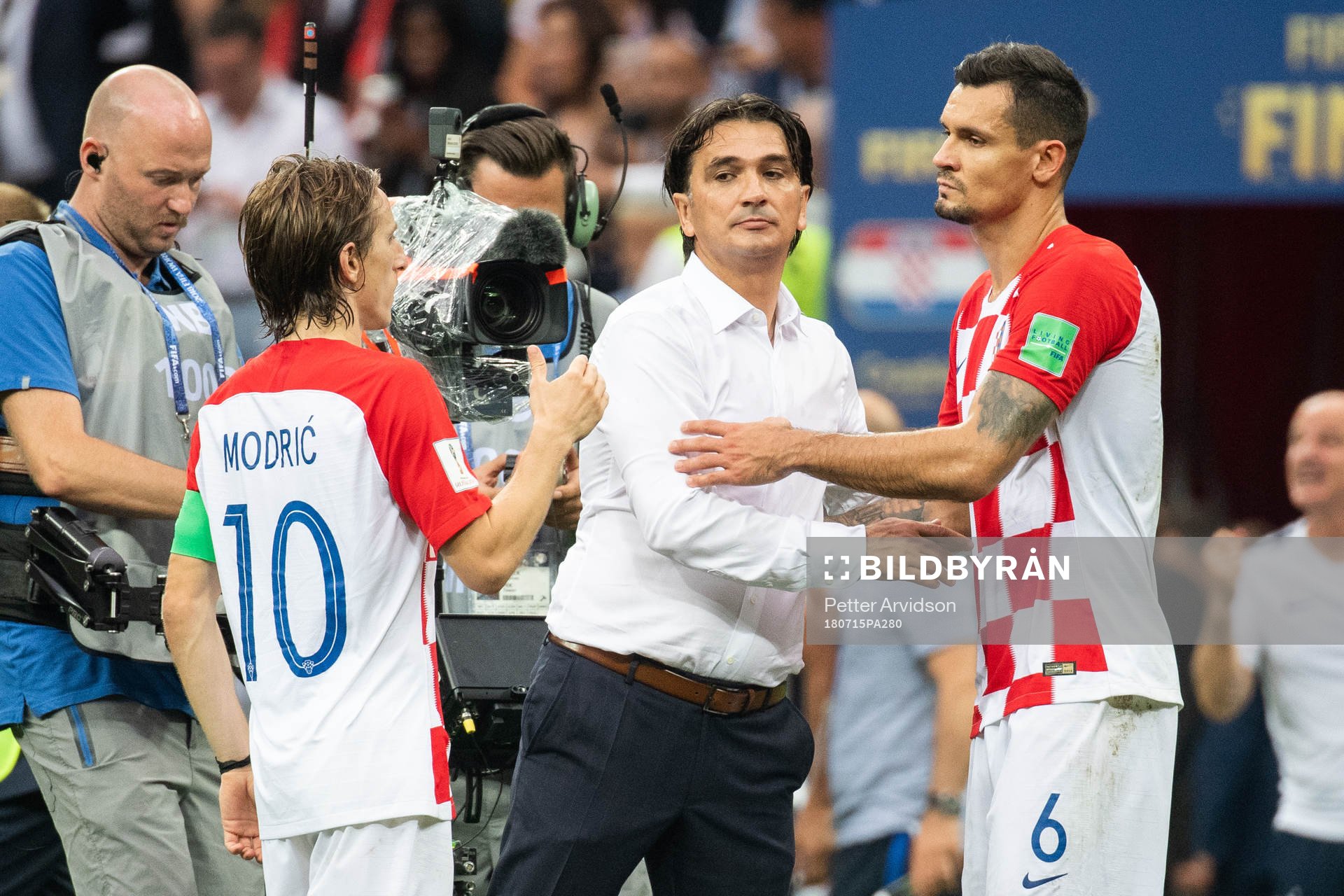 Luka Modric, head coach Zlatko Dalic and Dejan Lovren of