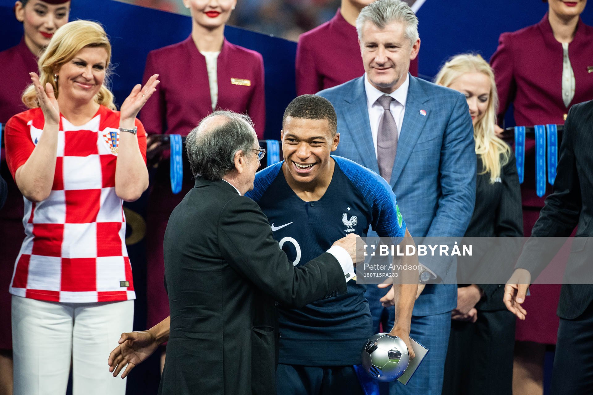Kylian Mbappe of France with the award for best young