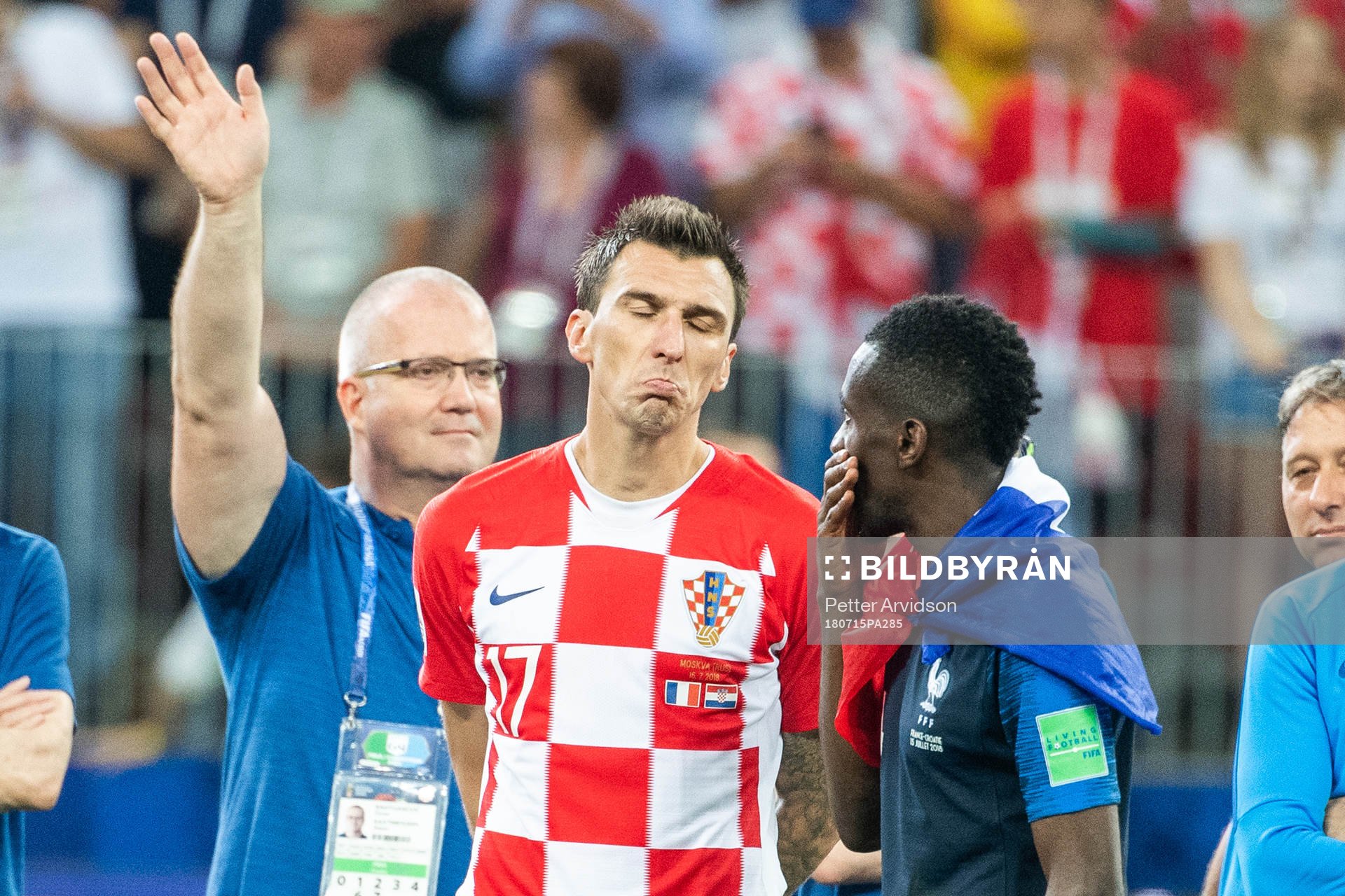 Mario Mandzukic of Croatia looks dejected while talking to