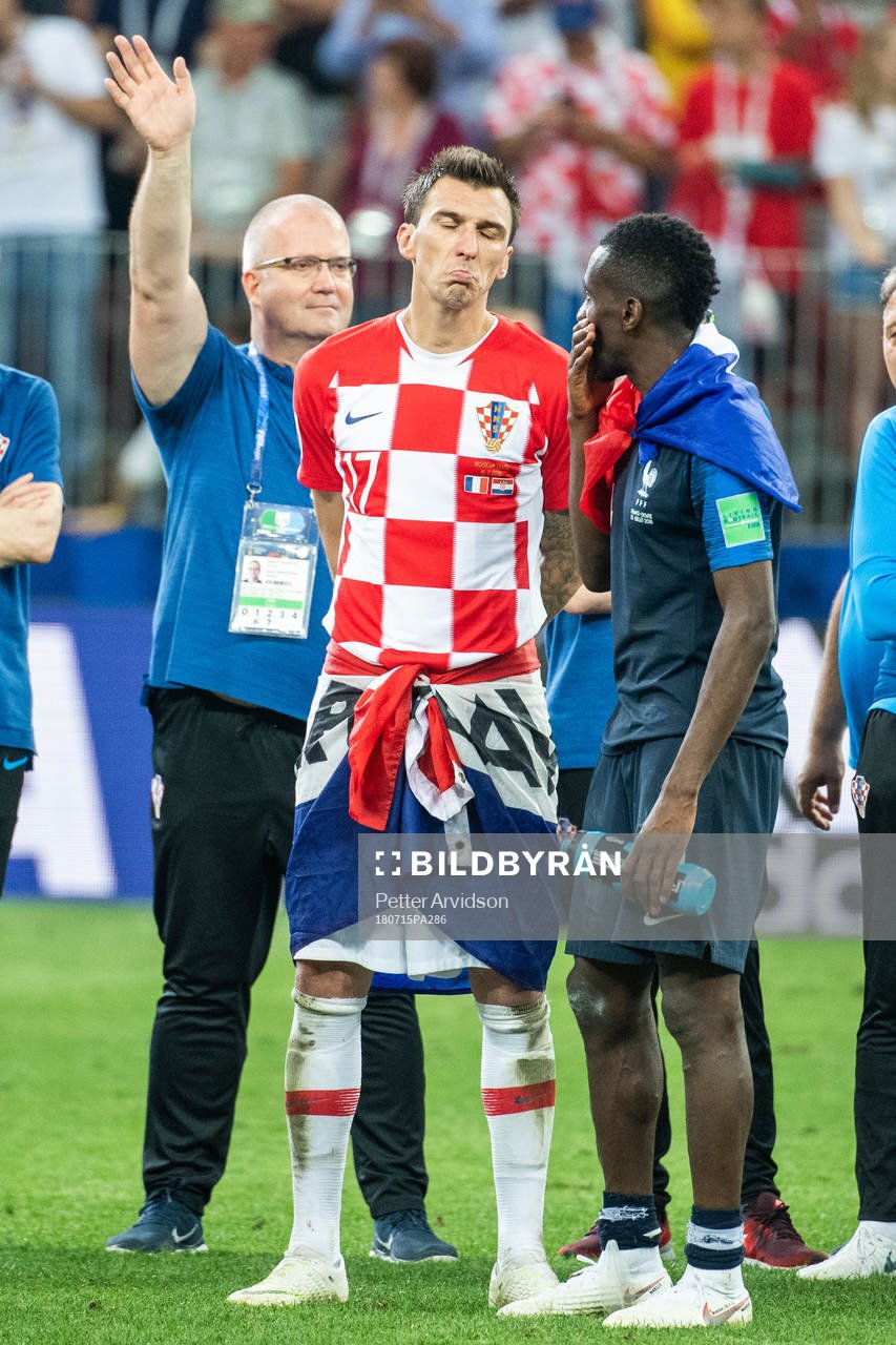Mario Mandzukic of Croatia looks dejected while talking to