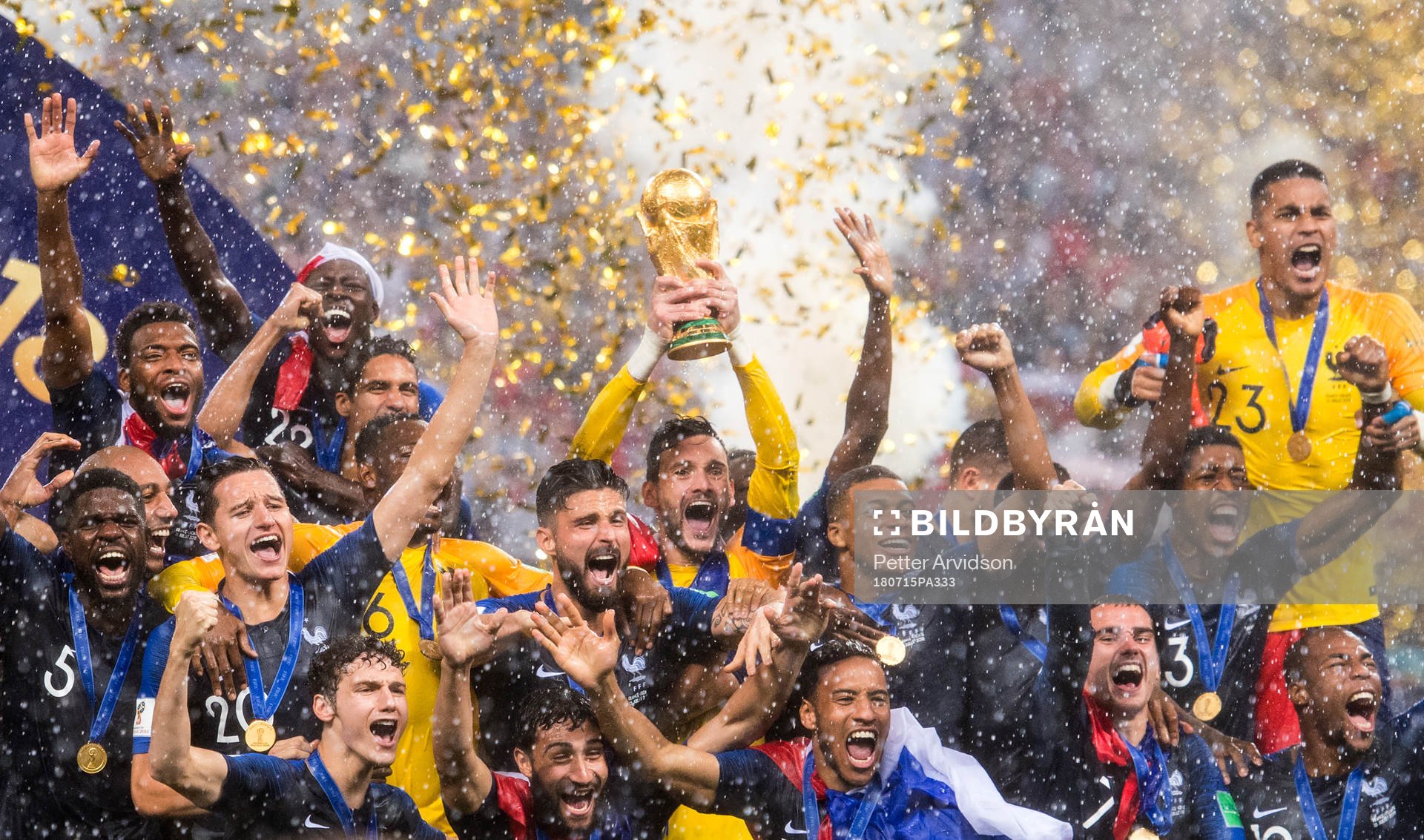 Players of France celebrate with the trophy