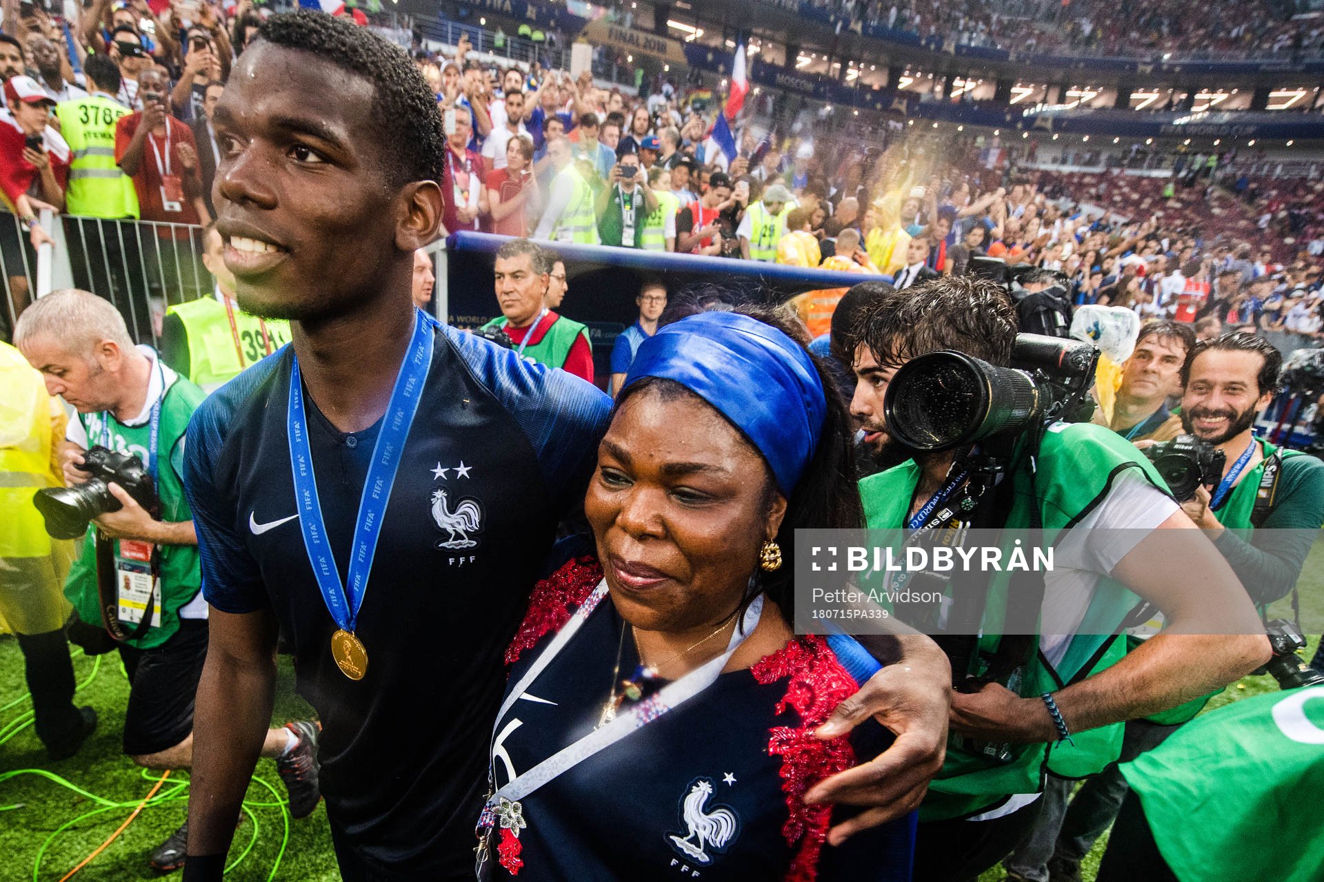 Paul Pogba of France and his mother celebrate