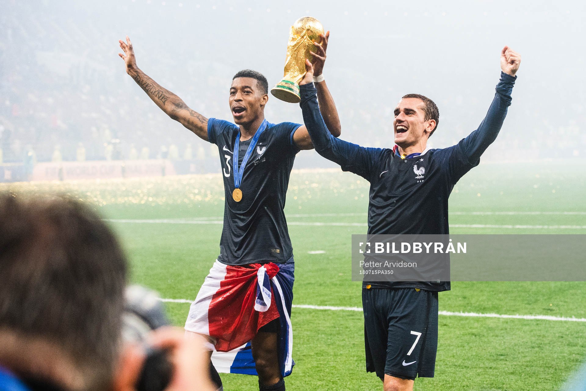 Presnel Kimpembe and Antoine Griezmann of France celebrate