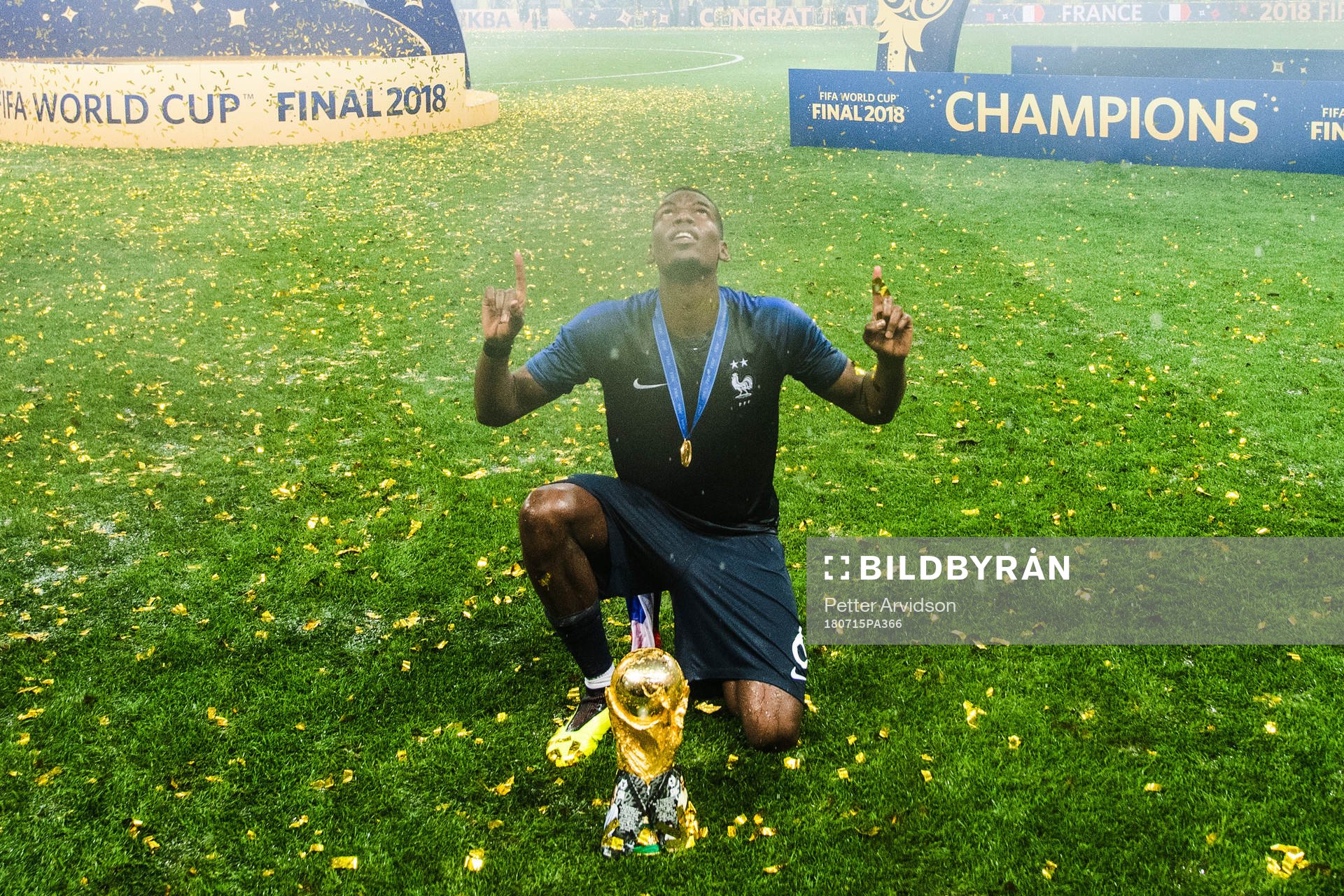 Paul Pogba of France celebrates with the trophy