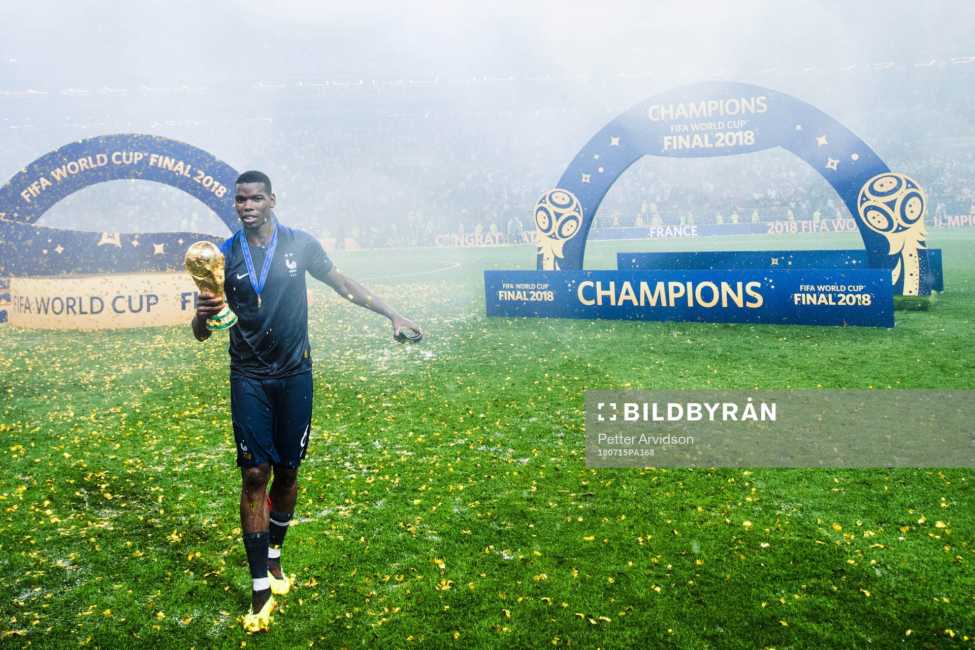 Paul Pogba of France celebrates with the trophy
