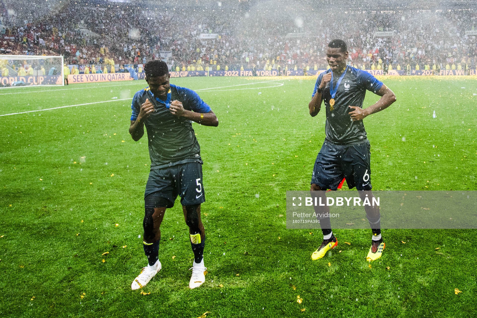 Samuel Umtiti and Paul Pogba of France celebrate