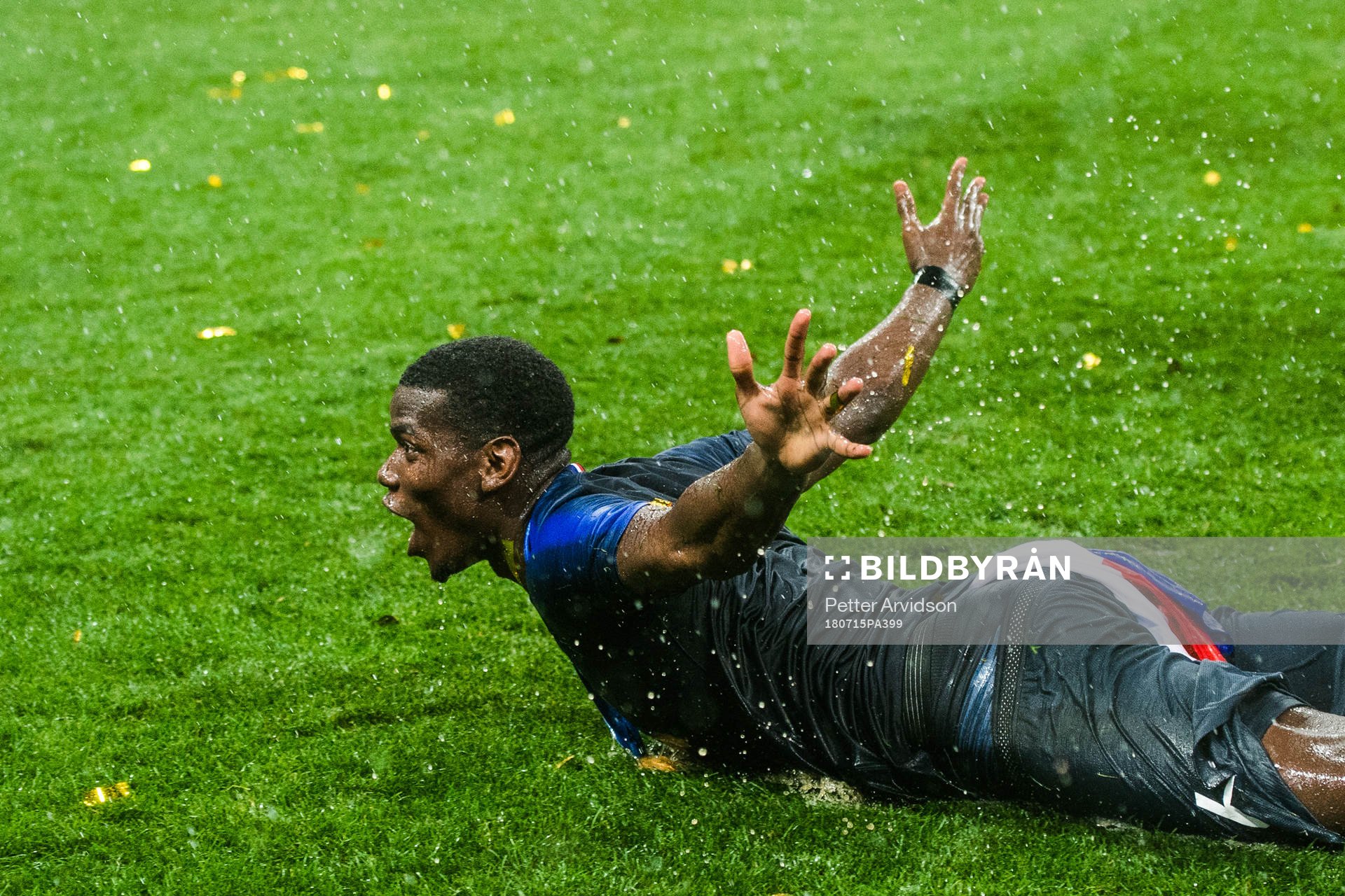 Paul Pogba of France slides
