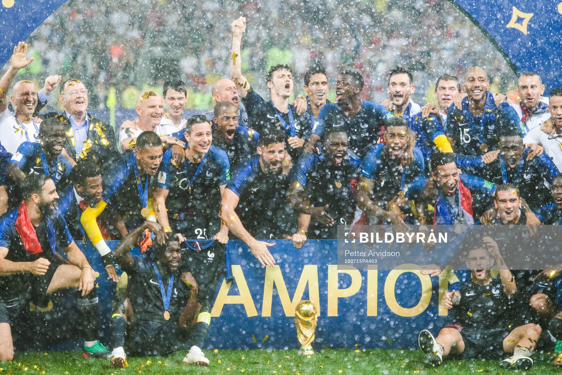 Players of France celebrate with the trophy