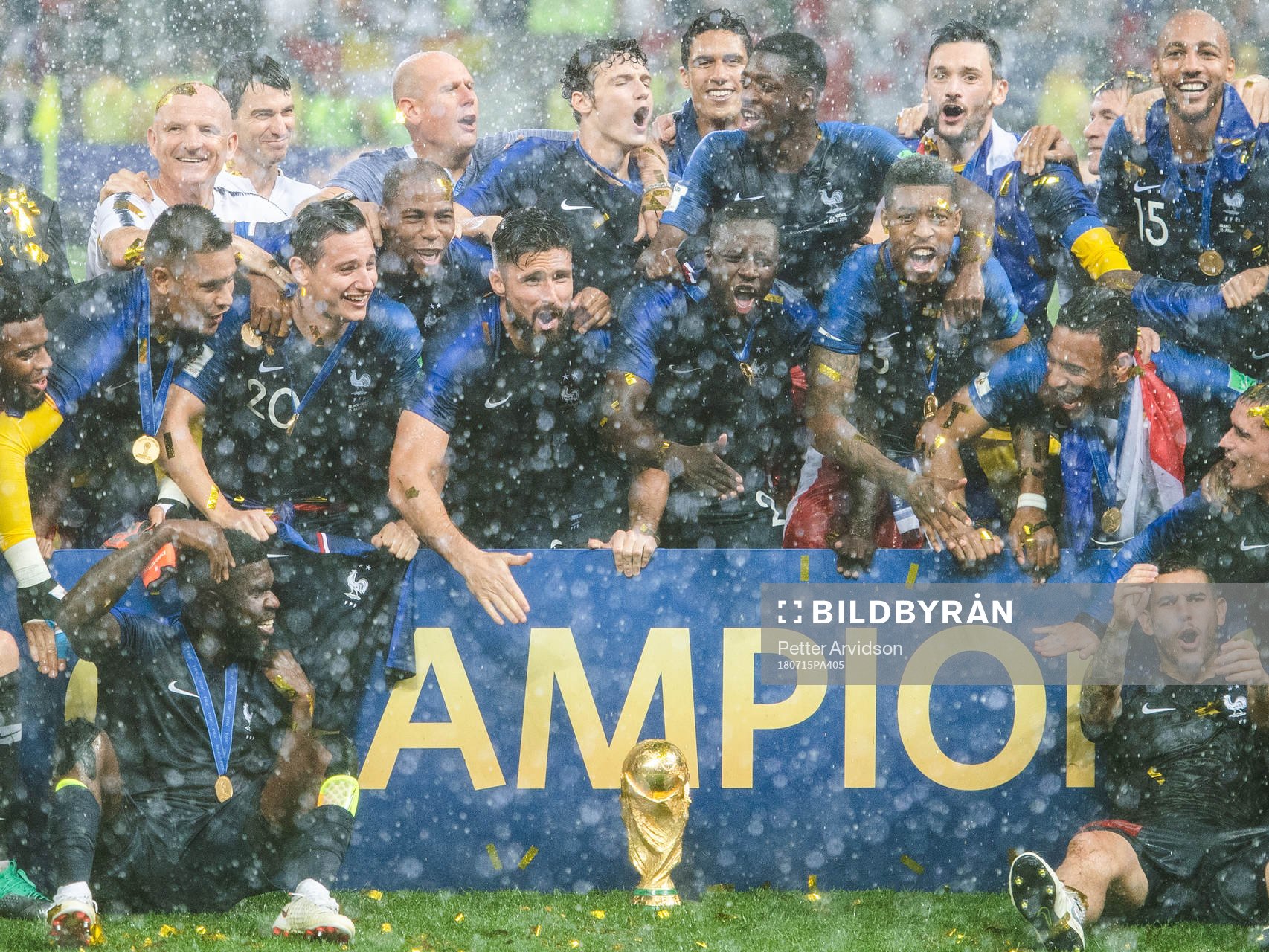 Players of France celebrate with the trophy