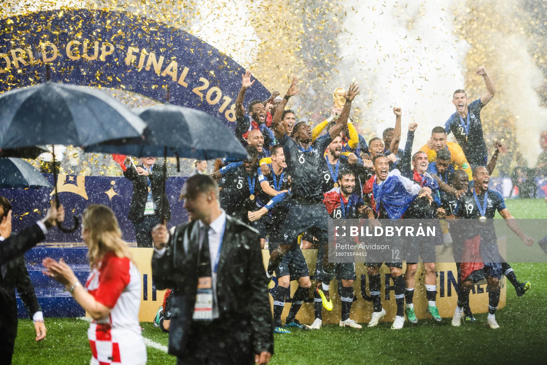 Players of France celebrate with the trophy