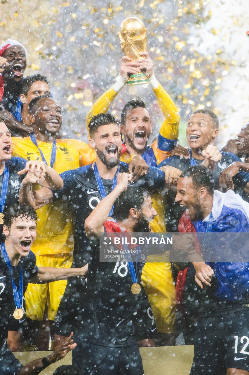 Players of France celebrate with the trophy after winning the FIFA World Cup final match between France and Croatia on July 15, 2018 in Moscow.