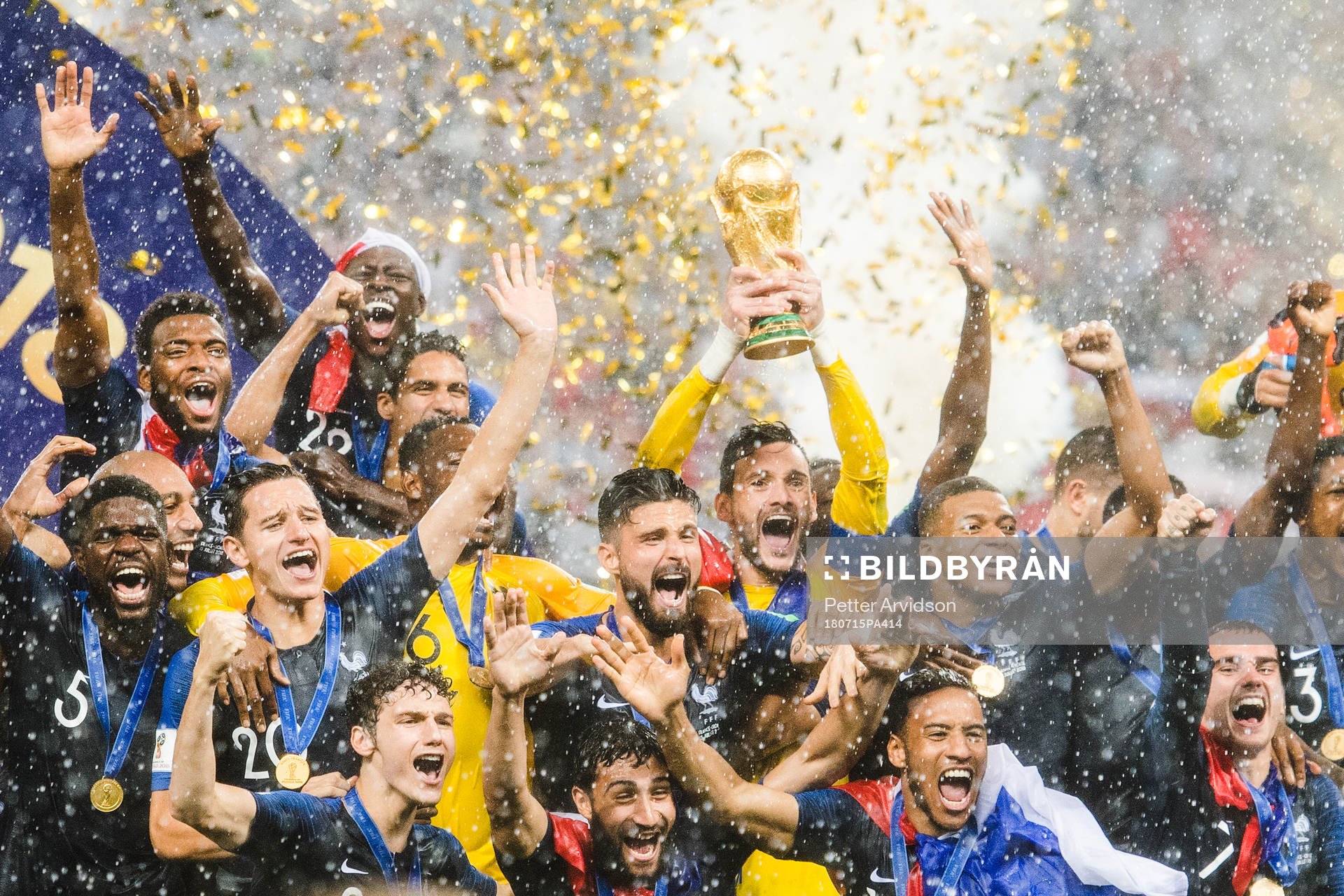Players of France celebrate with the trophy