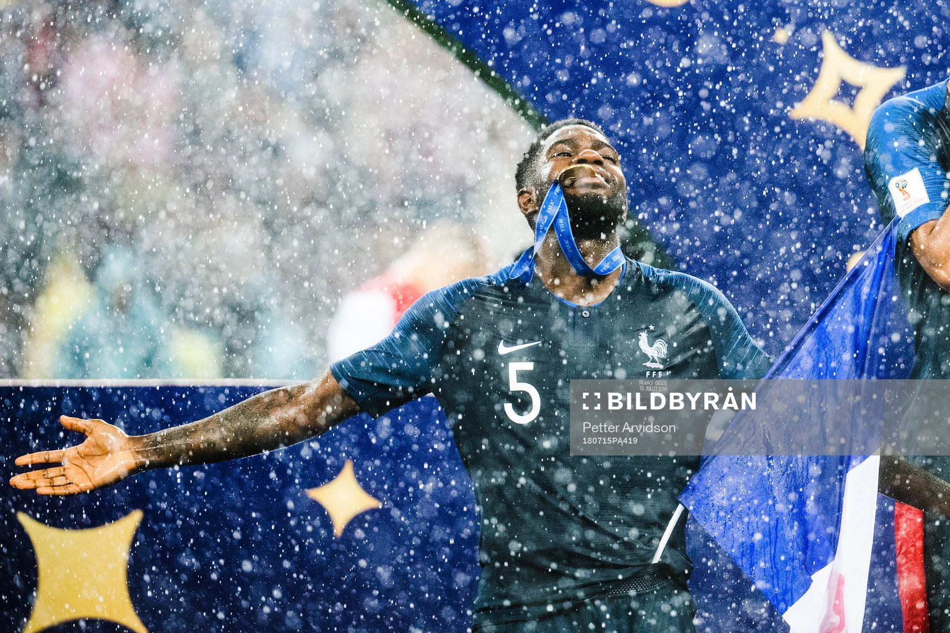 Samuel Umtiti of France celebrates with the gold medal