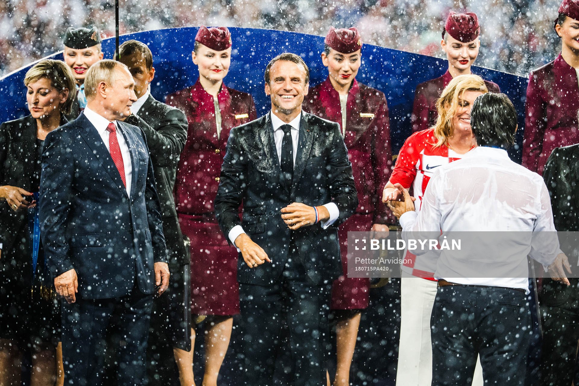 The President of Russia Vladimir Putin, President of France Emmanuel Macron and President of Croatia Kolinda Grabar-Kitarovic at the medal ceremony after the FIFA World Cup final match between France and Croatia on July 15, 2018 in Moscow.