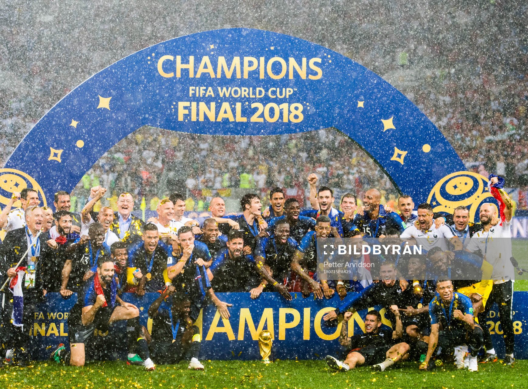 Players of France celebrate with the trophy