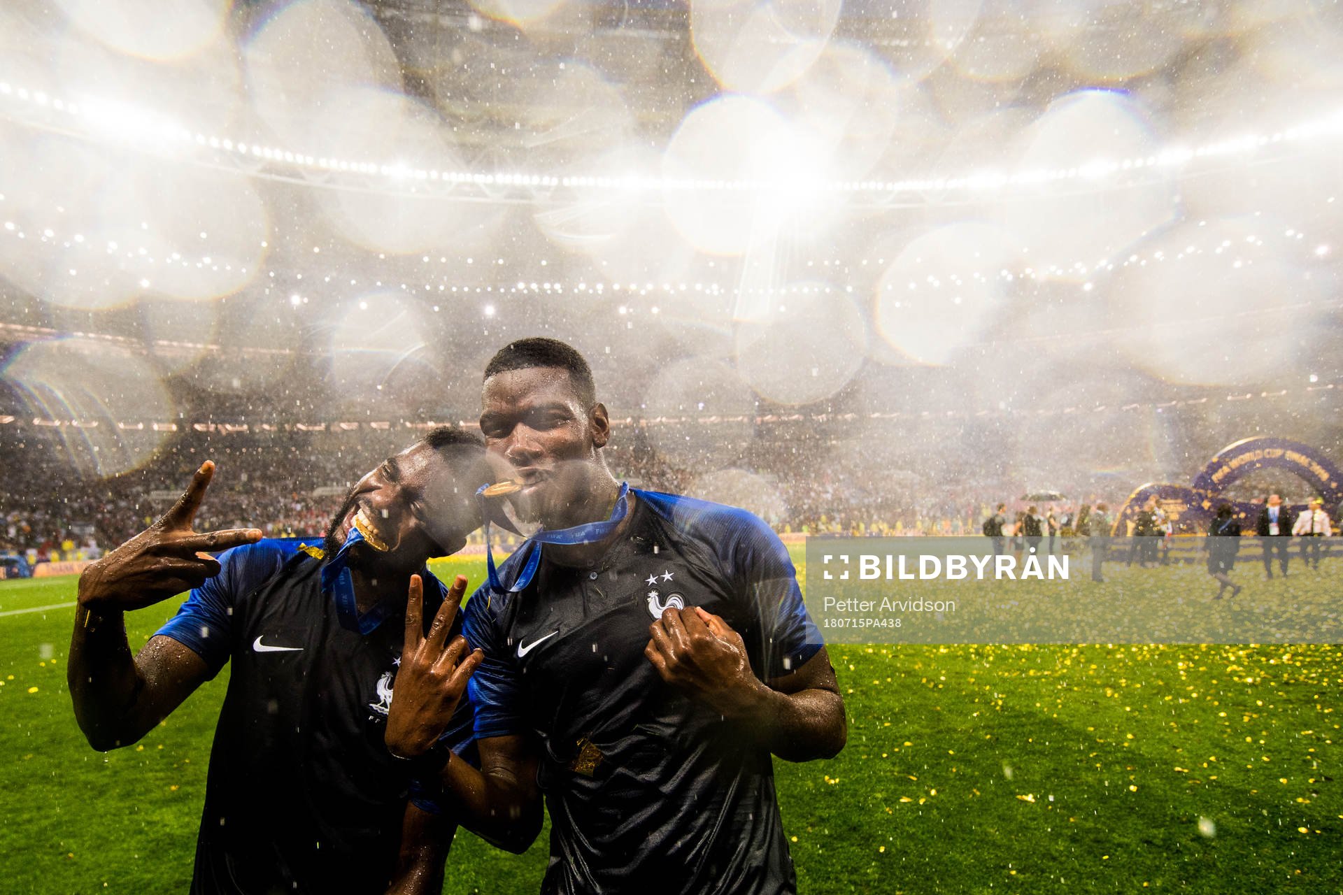Samuel Umtiti and Paul Pogba of France celebrate
