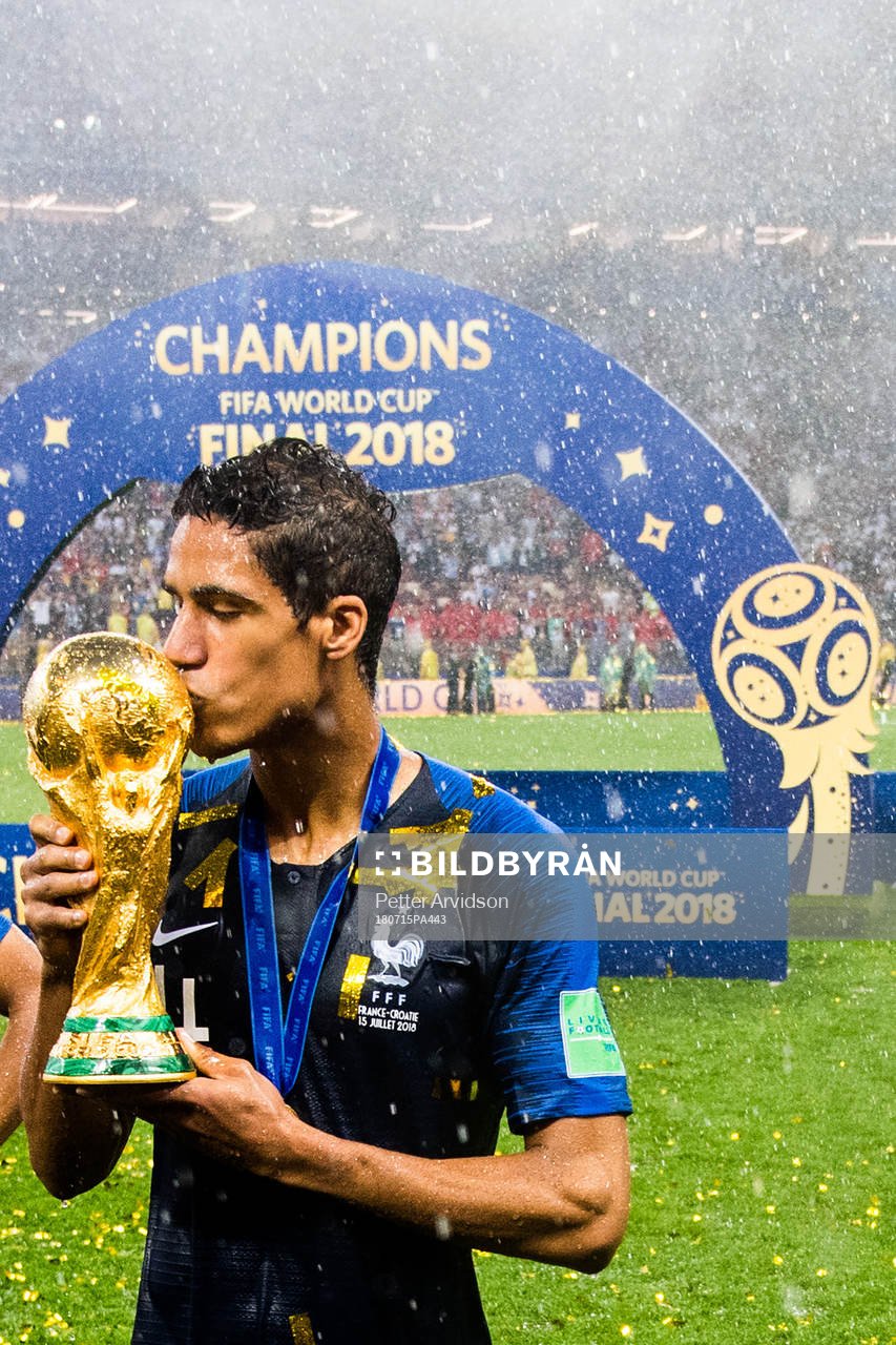 Raphael Varane of France celebrate with the trophy