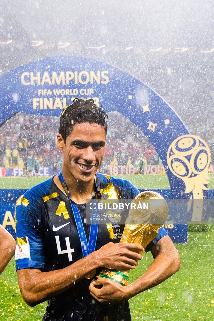Raphael Varane of France celebrate with the trophy