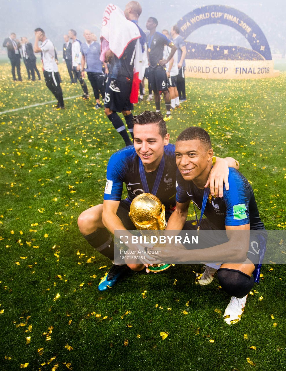 Florian Thauvin and Kylian Mbappe of France celebrate with