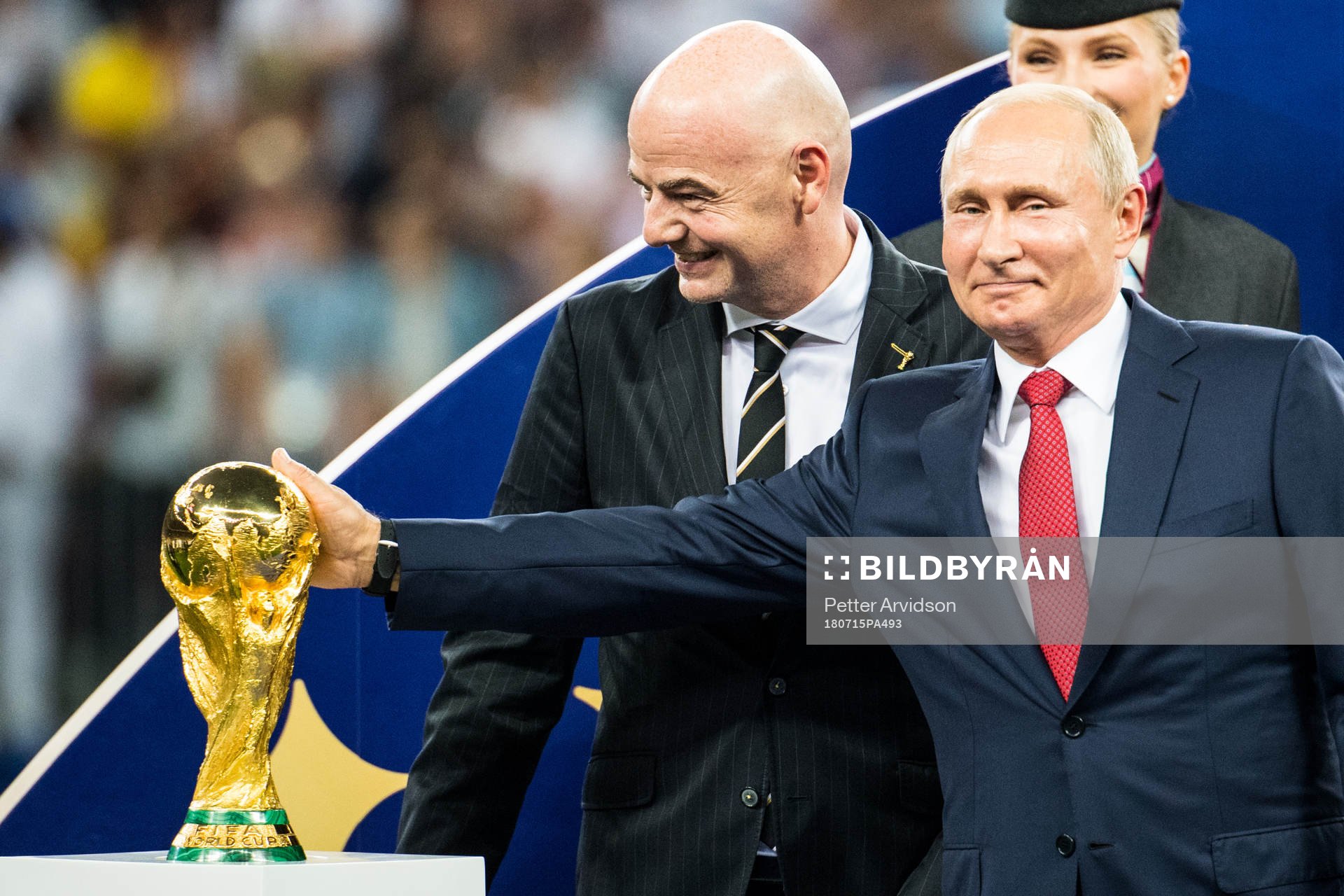 FIFA president Gianni Infantino and Vladimir Putin, president of Russia with the trophy after the FIFA World Cup final match between France and Croatia on July 15, 2018 in Moscow.