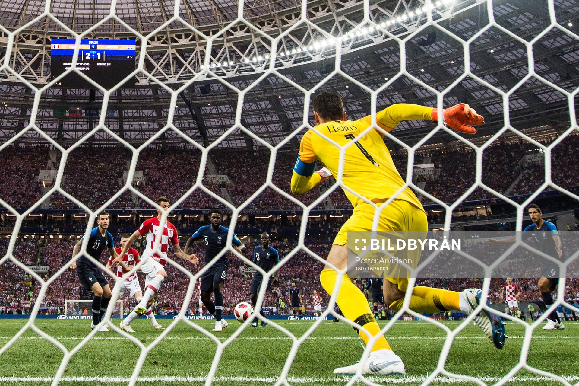 Goalkeeper Hugo Lloris of France and Mario Mandzukic of