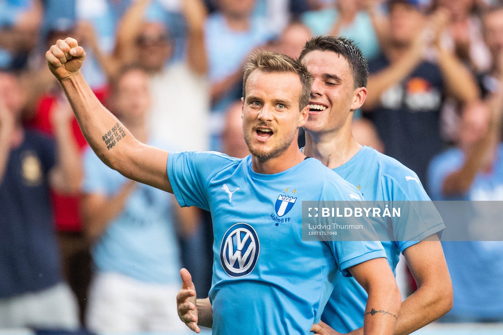 Eric Larsson celebrates with Samuel Adrian of Malmö FF