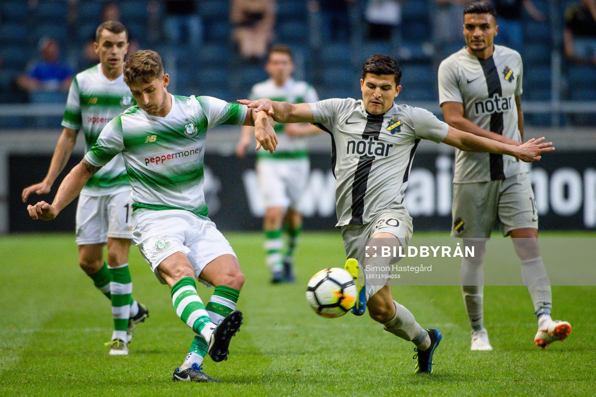 Lee Grace of Shamrock Rovers and Tarik Elyounoussi of AIK