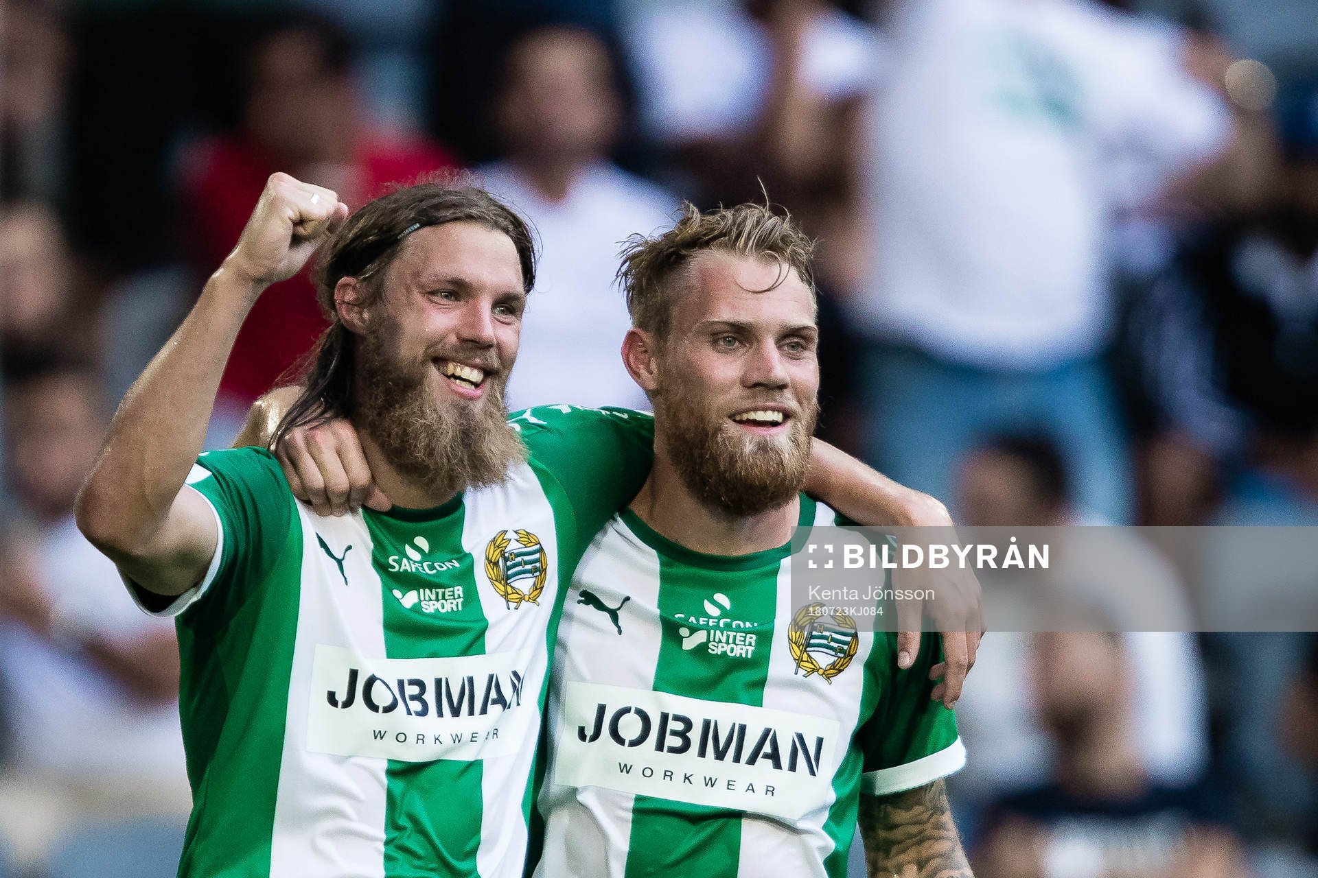 Hammarbys Björn Paulsen och David Fällman jublar efter 3-0 av Nikola Djurdjic under fotbollsmatchen i Allsvenskan mellan Hammarby och Dalkurd den 23 Juli 2018 i Stockholm.