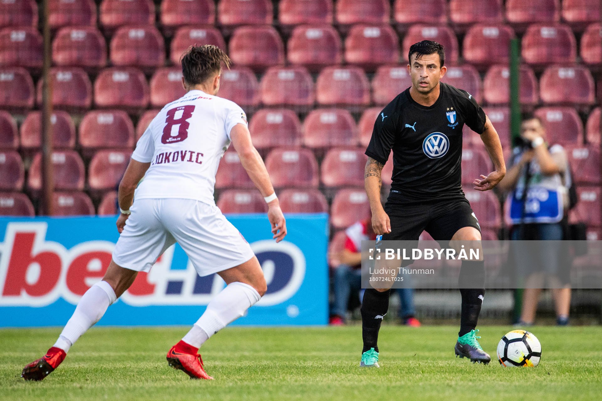 Damjan Djokovic of Cluj and Behrang Safari of Malmö FF