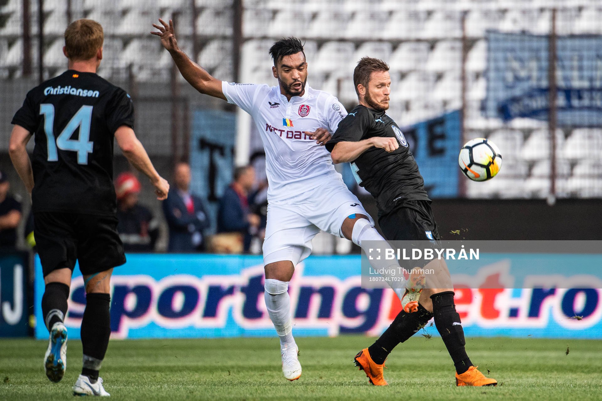 Billel Omrani of Cluj and Lasse Nielsen of Malmö FF