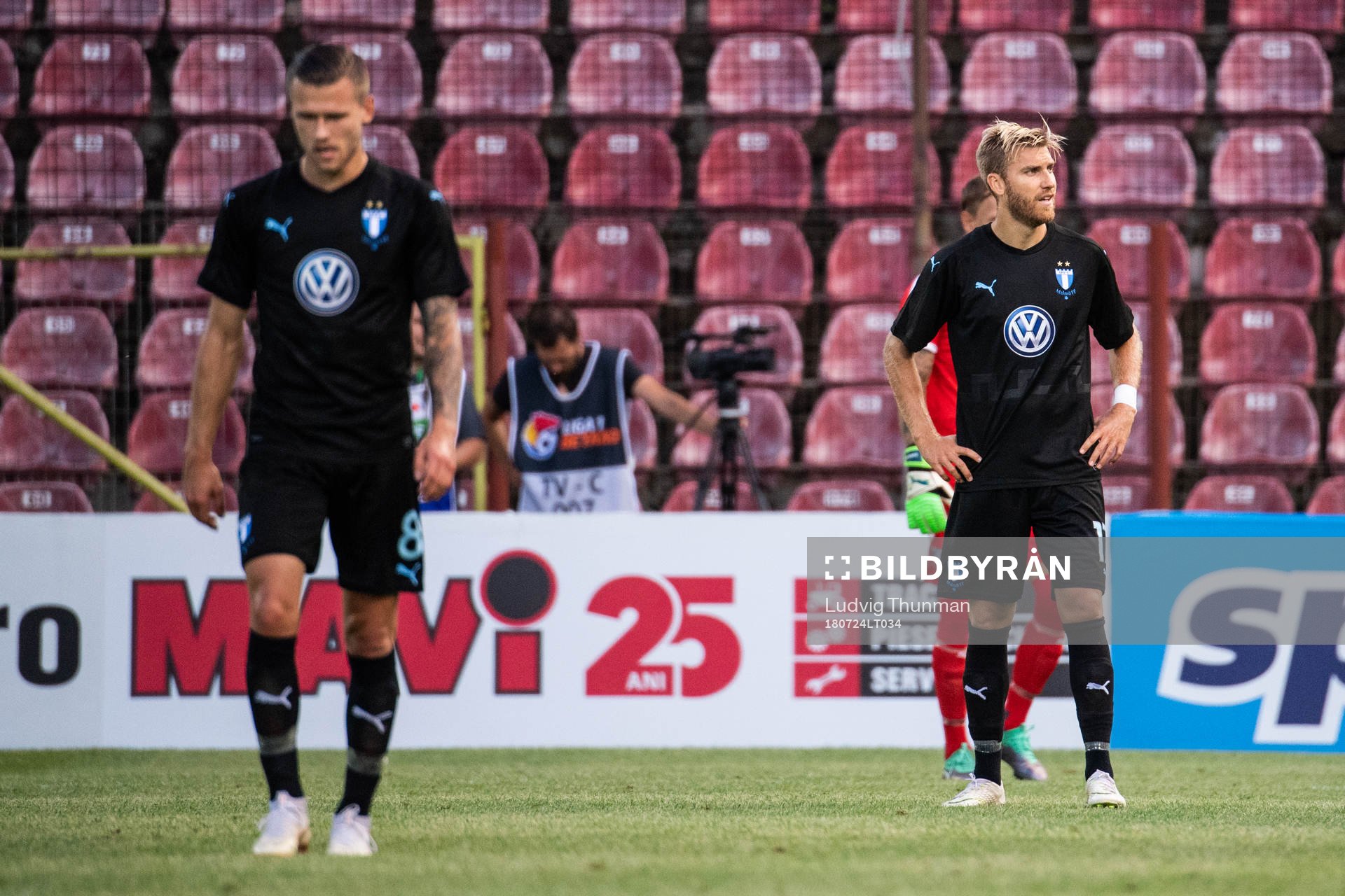 Arnór Ingvi Traustason and Rasmus Bengtsson looks dejected