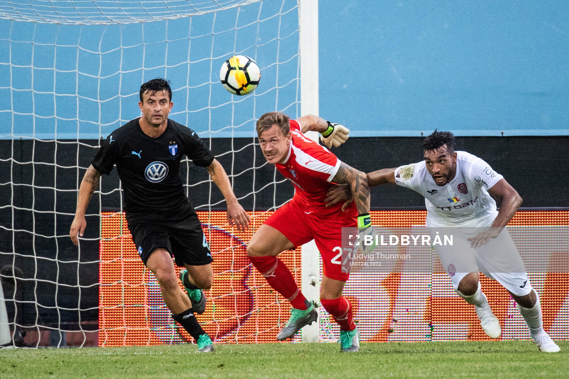 Behrang Safari and goalkeeper Johan Dahlin of Malmö FF