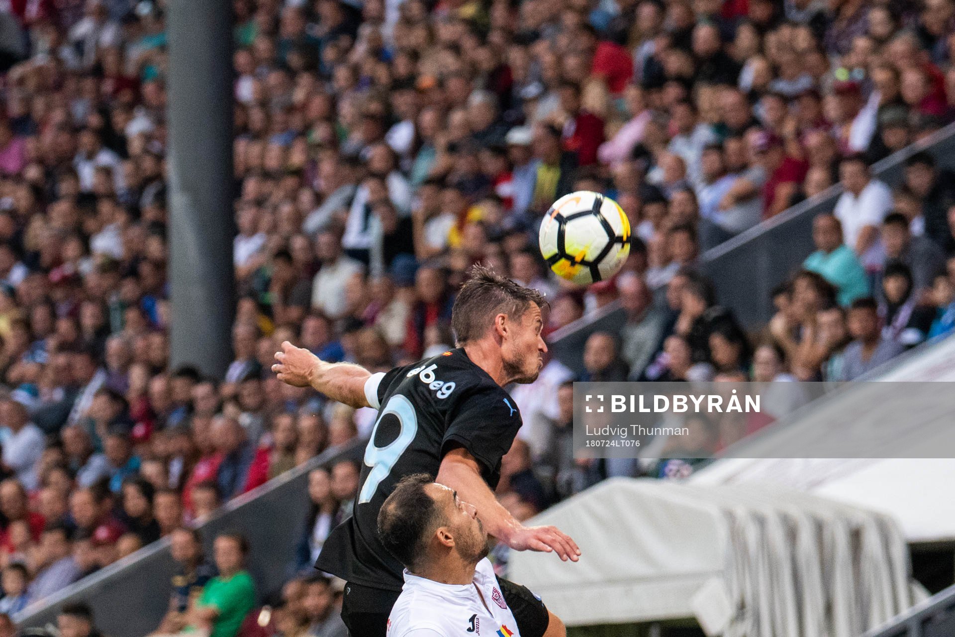 Markus Rosenberg of Malmö FF and Paulo Vinicius of Cluj
