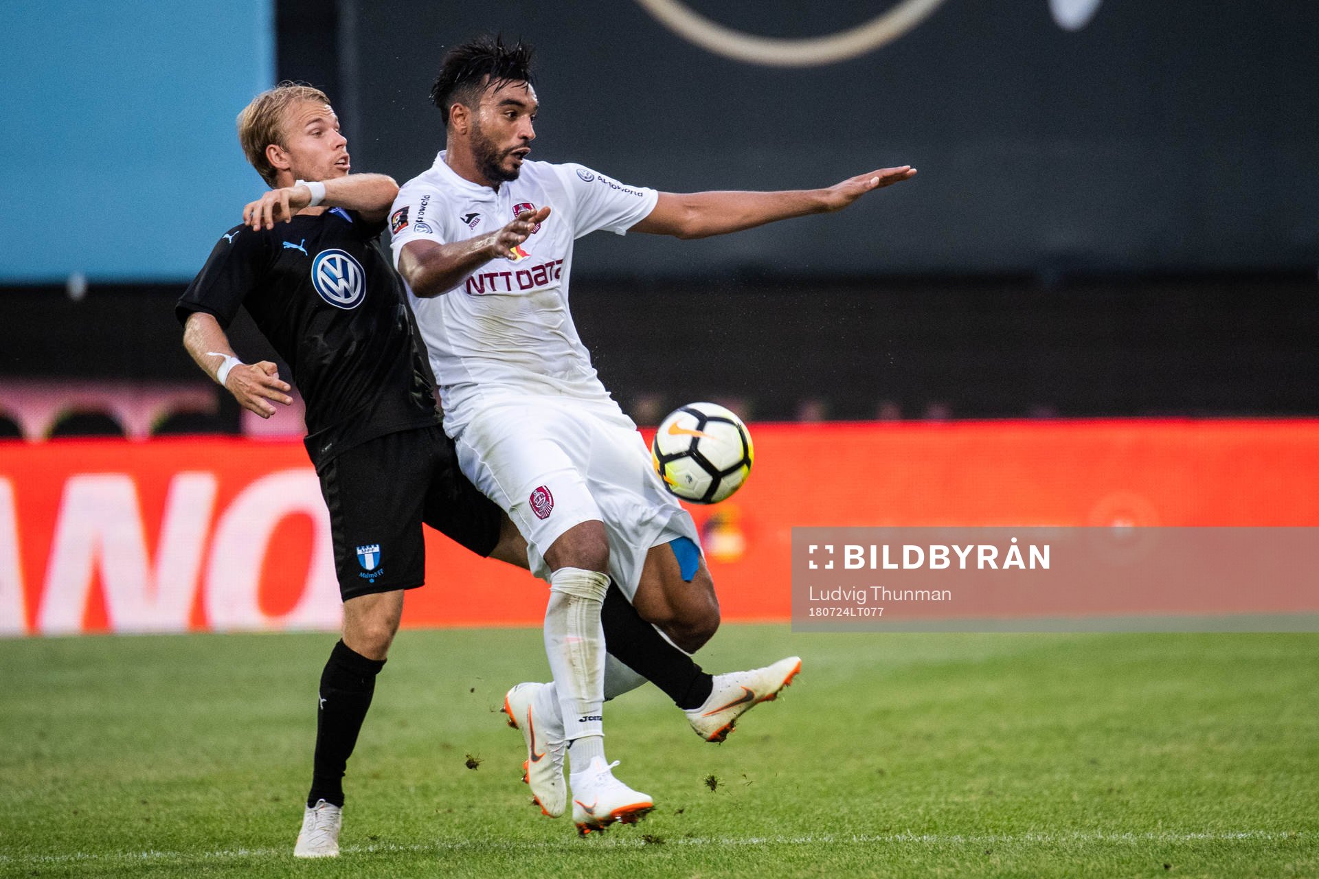 Oscar Lewicki of Malmö FF and Billel Omrani of Cluj