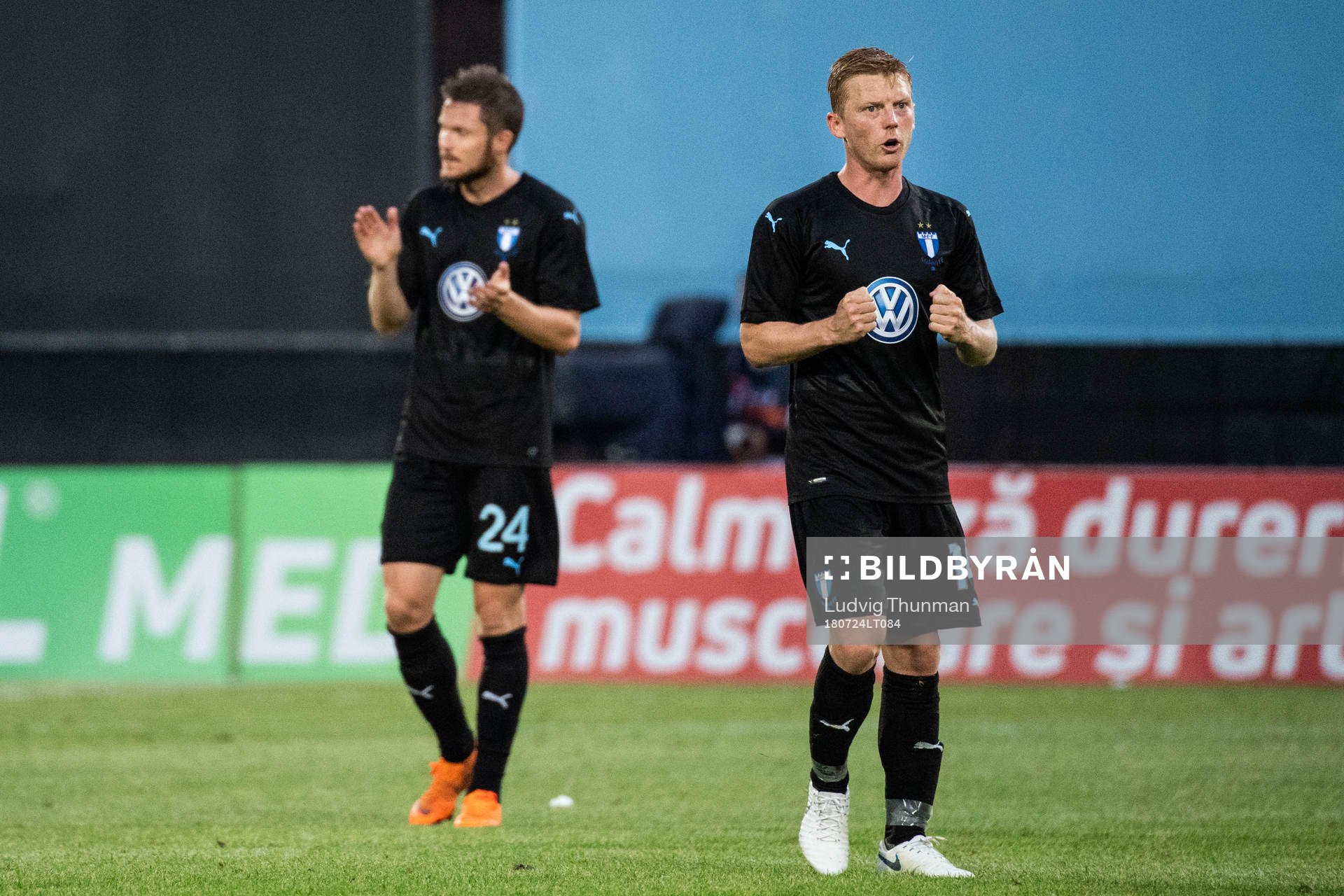 Lasse Nielsen and Anders Christiansen of Malmö FF celebrate after winning the UEFA Champions League qualifying match between Cluj and Malmö FF on July 24, 2018 in Cluj.
